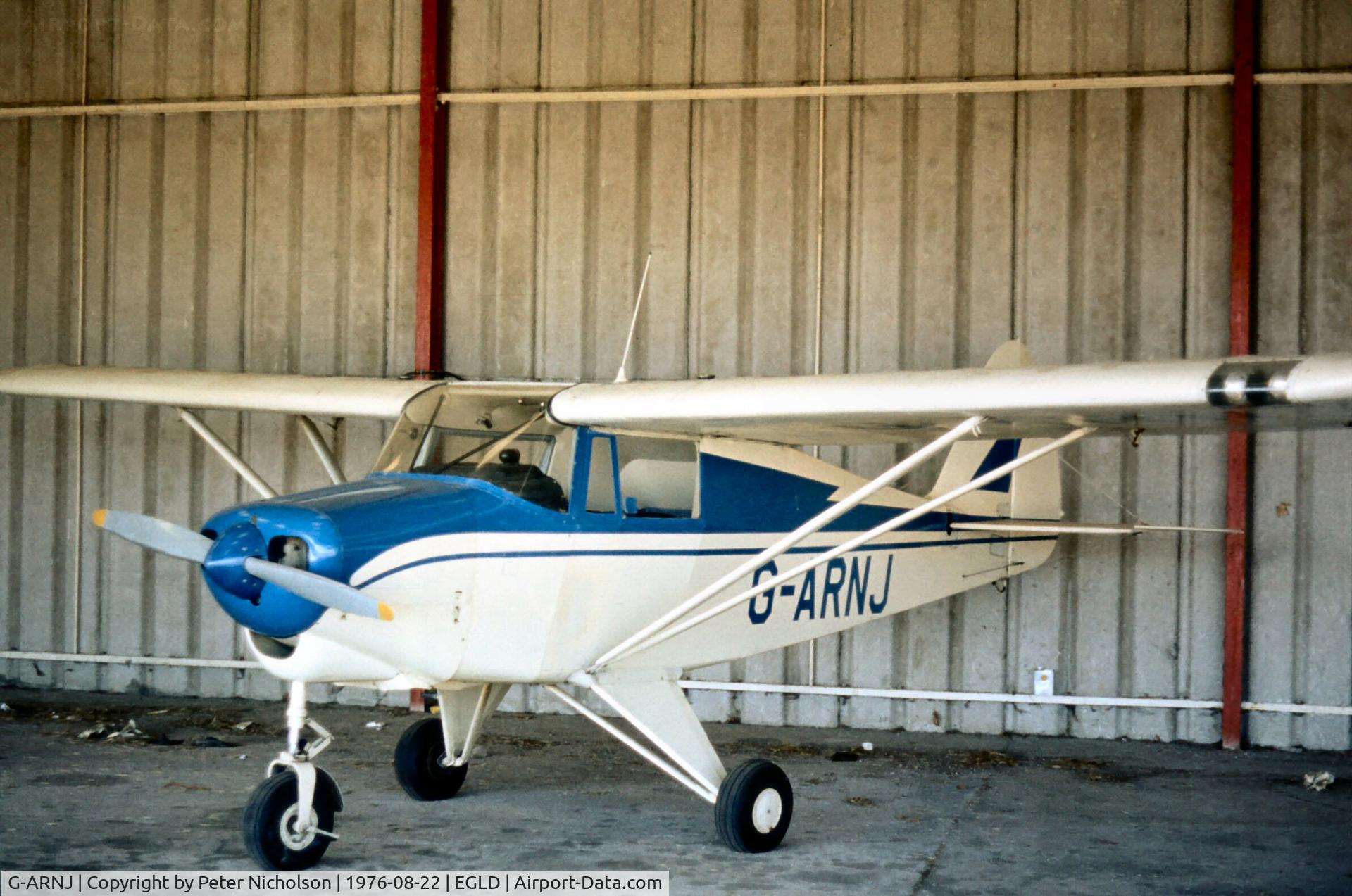 G-ARNJ, 1961 Piper PA-22-108 Colt Colt C/N 22-8587, Seen hangered at Denham in the Summer of 1976.