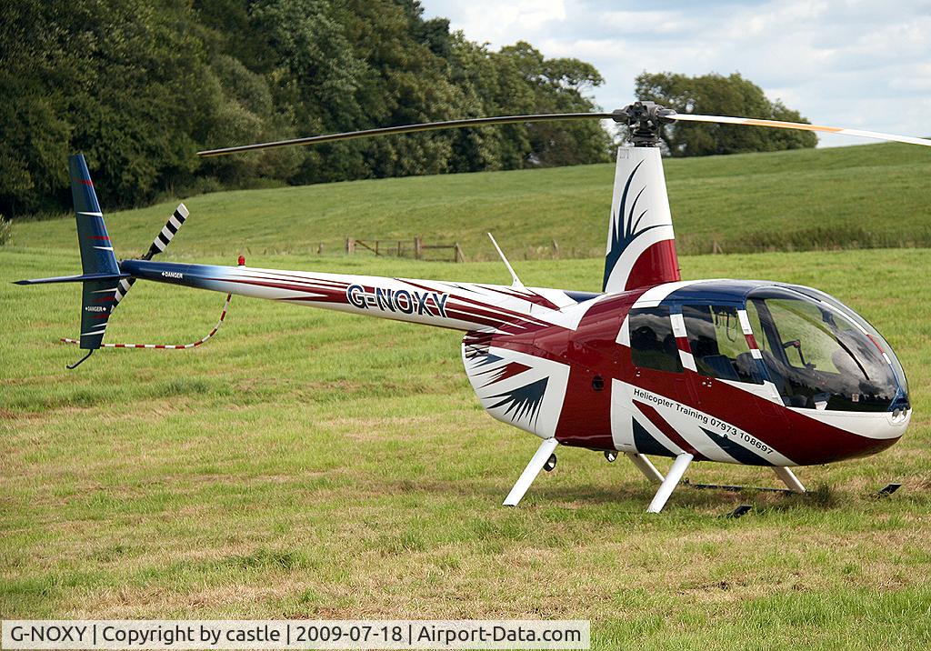 G-NOXY, 2004 Robinson R44 Raven C/N 1421, seen @ Cholmondeley