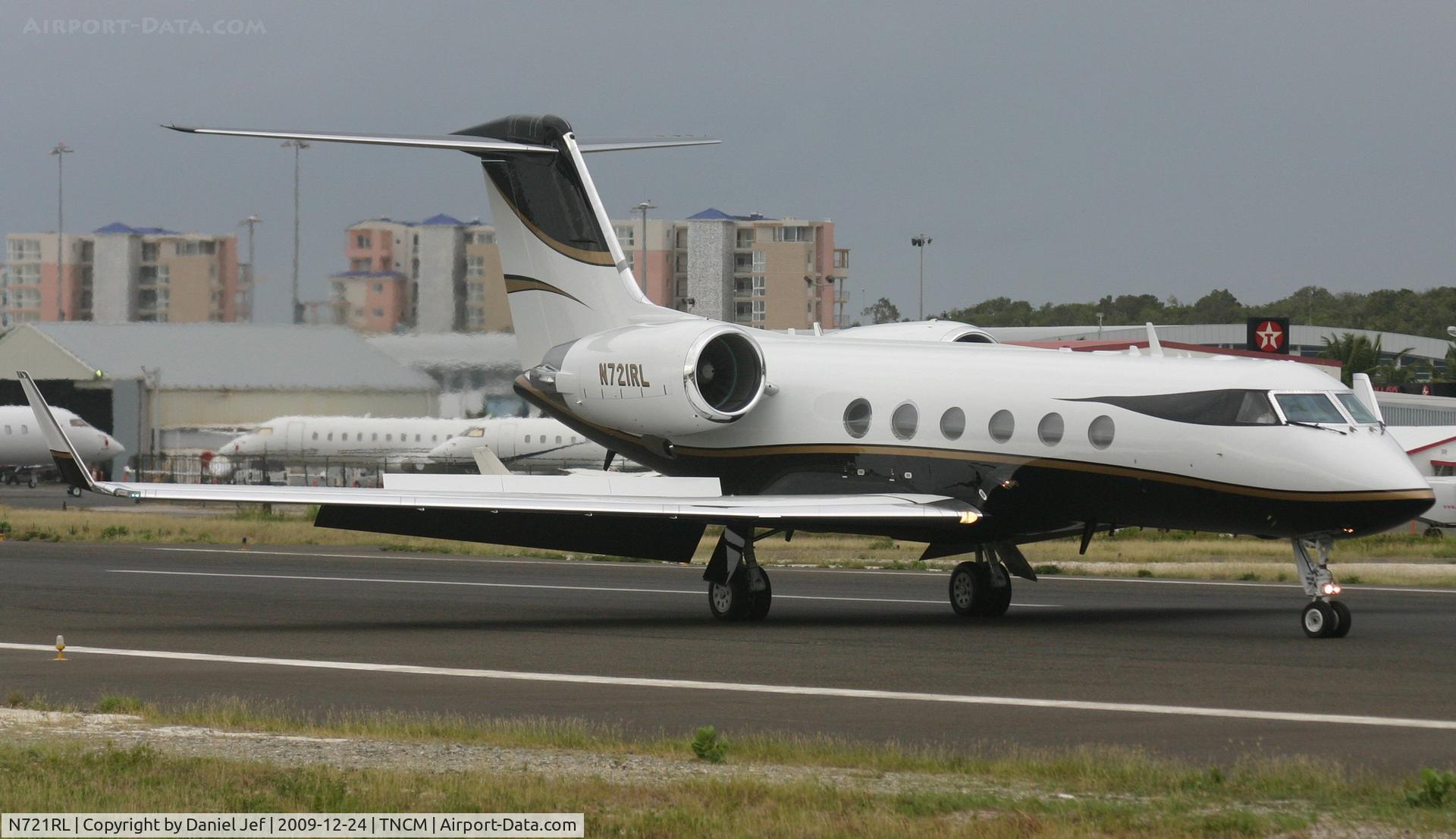 N721RL, 1999 Gulfstream Aerospace G-IV C/N 1394, N721RL Just landed at TNCM and just rolling out befor back tracking runway 10 for parking at the cargo ramp