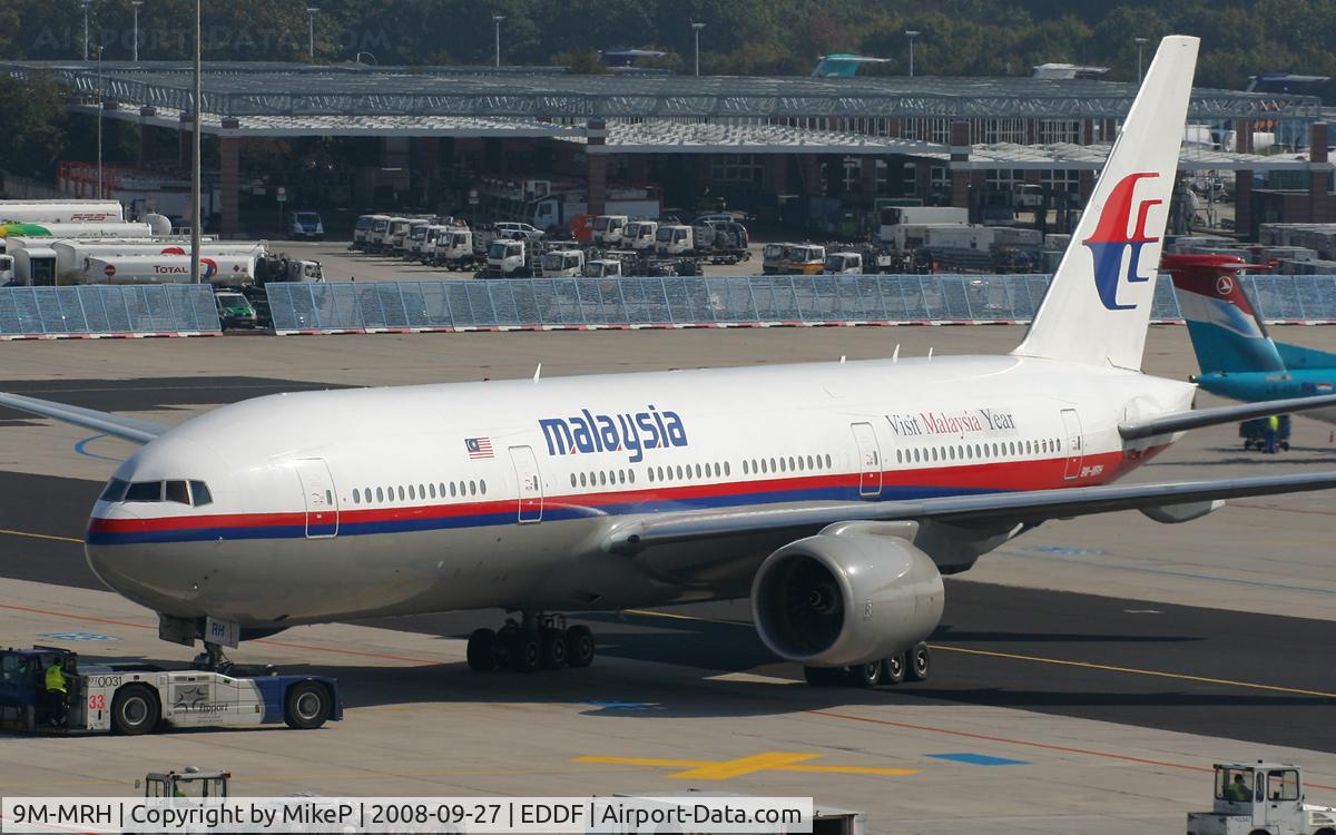 9M-MRH, 1998 Boeing 777-2H6/ER C/N 28415, Pushing for departure from T2.