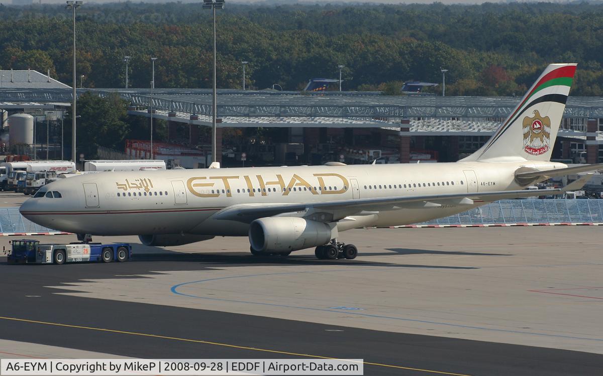 A6-EYM, 2007 Airbus A330-243 C/N 824, Pushing for departure from T2.