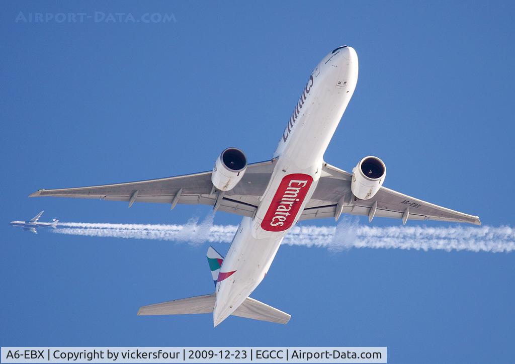 A6-EBX, 2007 Boeing 777-31H/ER C/N 32729, Emirates '777 on finals for RW23R at MAN with United '777 N798UA (UAL935) passing behind.