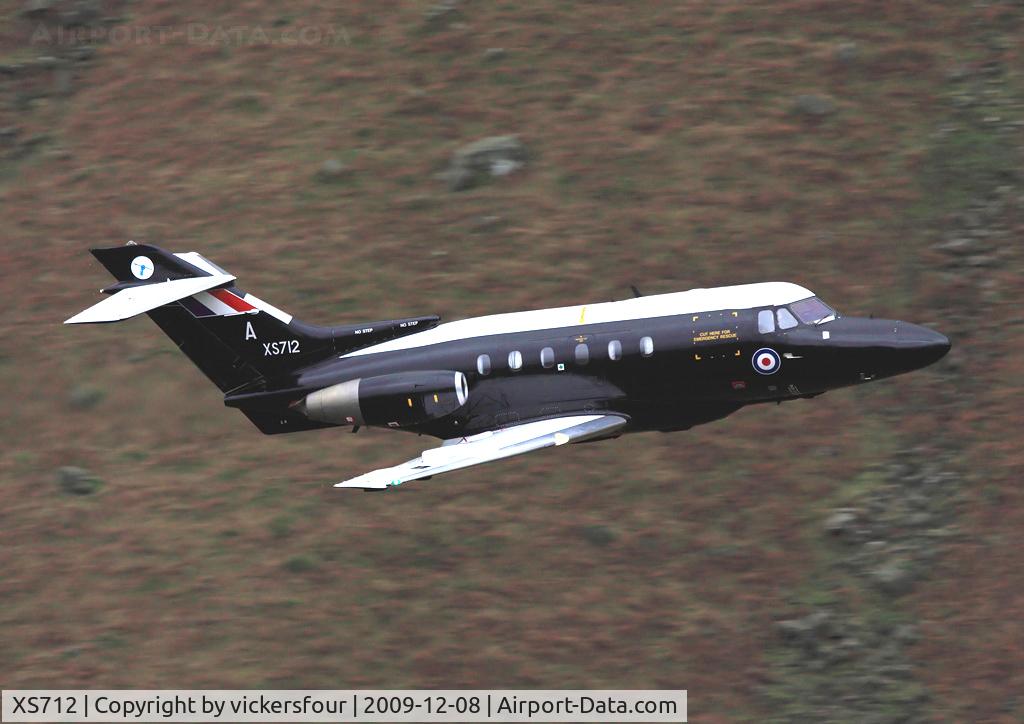XS712, 1965 Hawker Siddeley HS.125 Dominie T.1 C/N 25040, Royal Air Force. Taken as the Dominie flew low level through Dunmail Raise, Cumbria. Operated by 55 (R) Squadron code 'A', based at RAF Cranwell.