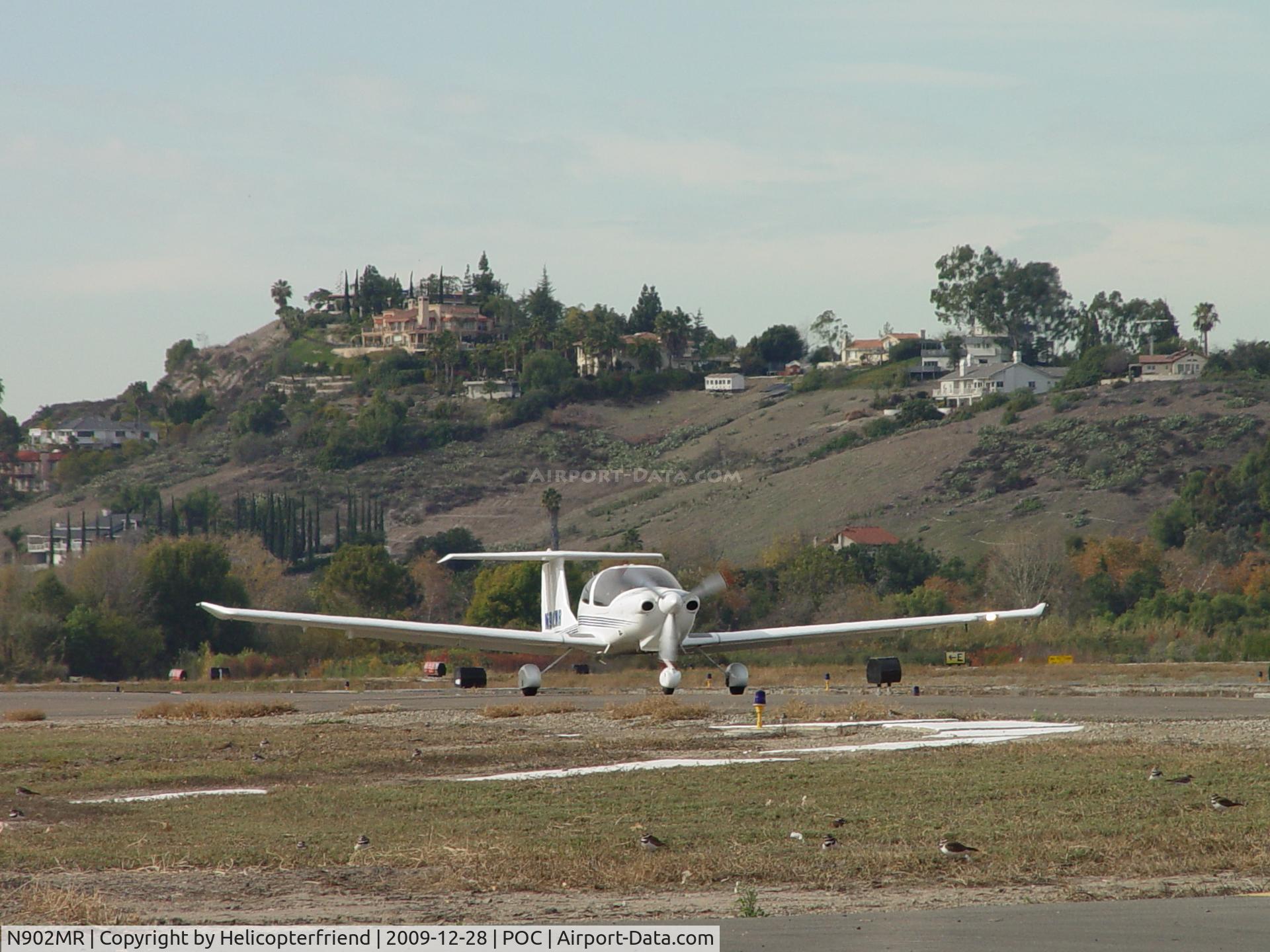 N902MR, 2006 Diamond DA-40 Diamond Star C/N 40.324, Taxiing back to 26L