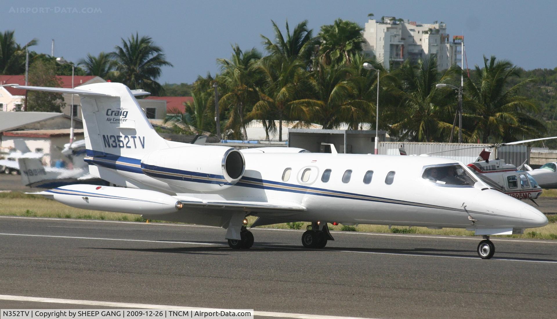 N352TV, 1981 Gates Learjet 35A C/N 410, N352TV Just landed at TNCM and taxing on the runway to parking at the Golf ramp.