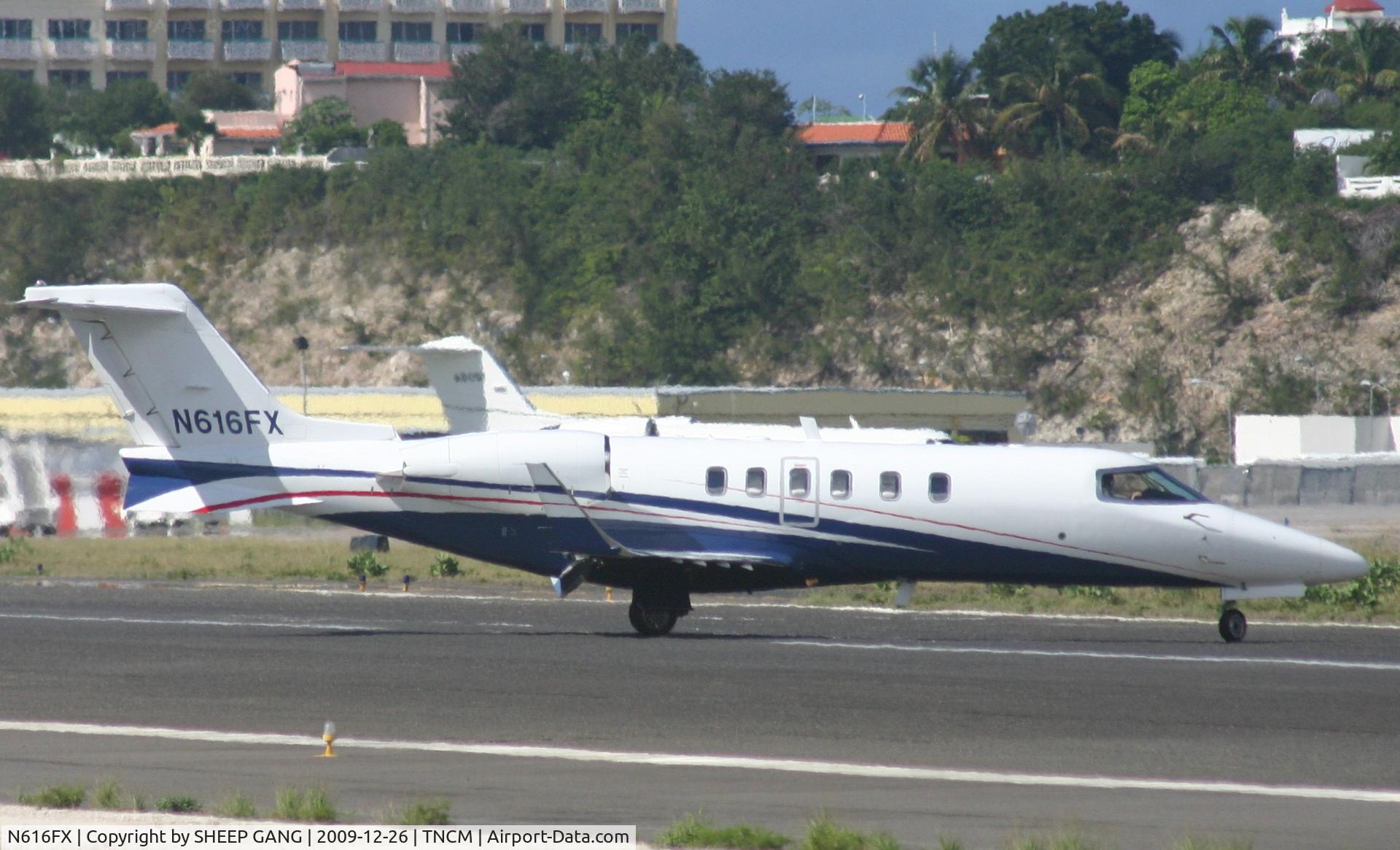 N616FX, 2006 Learjet Inc 45 C/N 2057, N616FX just landed at  TNCM and back tracking on the runway