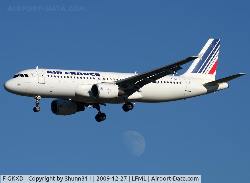F-GKXD, 2002 Airbus A320-214 C/N 1873, Landing rwy 31R with the moon...
