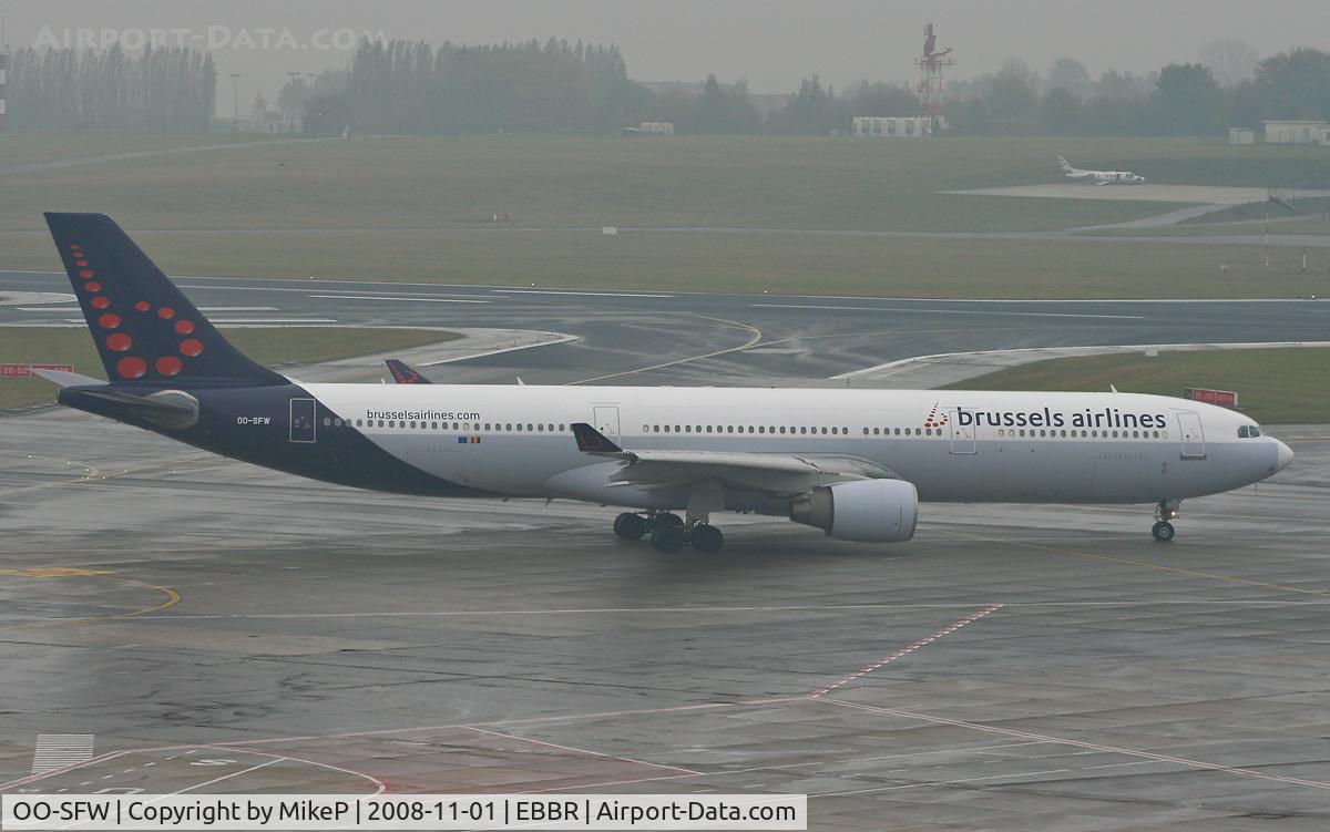 OO-SFW, 1994 Airbus A330-322 C/N 82, Heading to 07R for departure.
