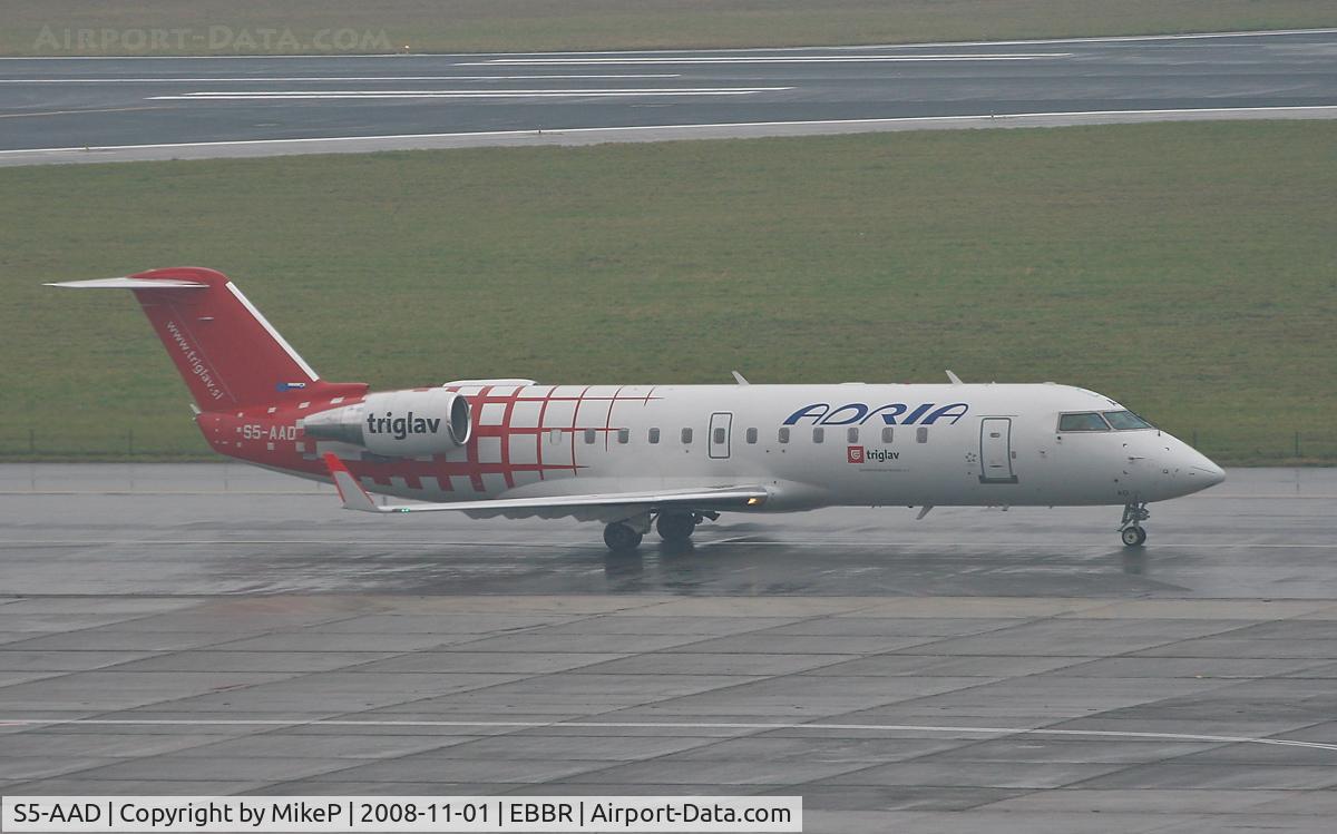 S5-AAD, 1997 Canadair CRJ-200LR (CL-600-2B19) C/N 7166, Heading to 07R for departure.