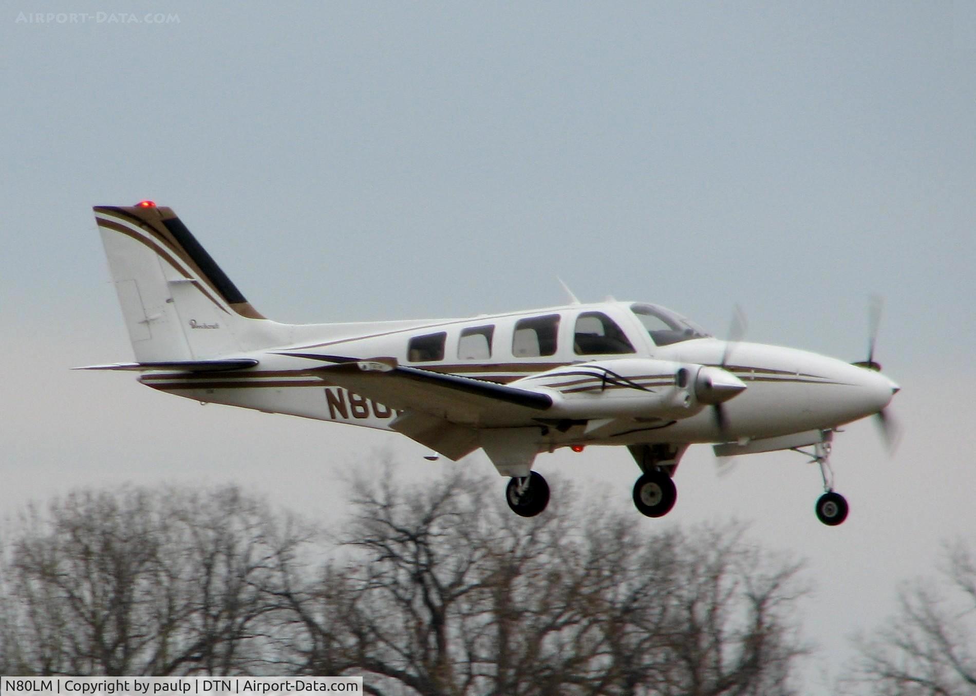 N80LM, 1979 Beech 58P Baron C/N TJ-216, Landing on 14 at Downtown Shreveport.