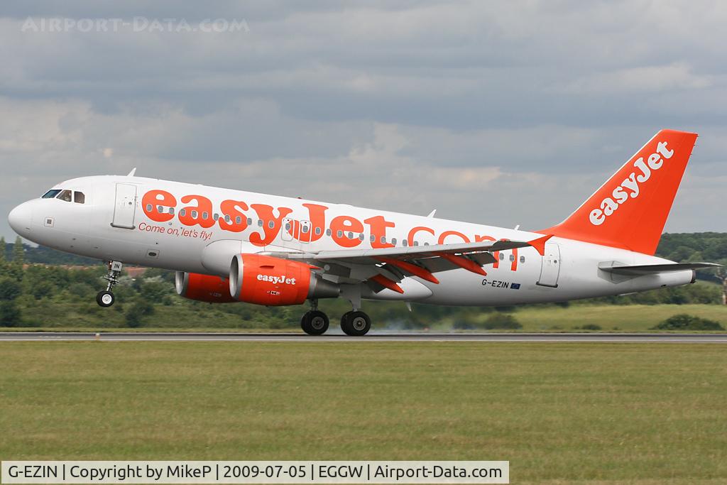 G-EZIN, 2005 Airbus A319-111 C/N 2503, Touchdown on Runway 26.