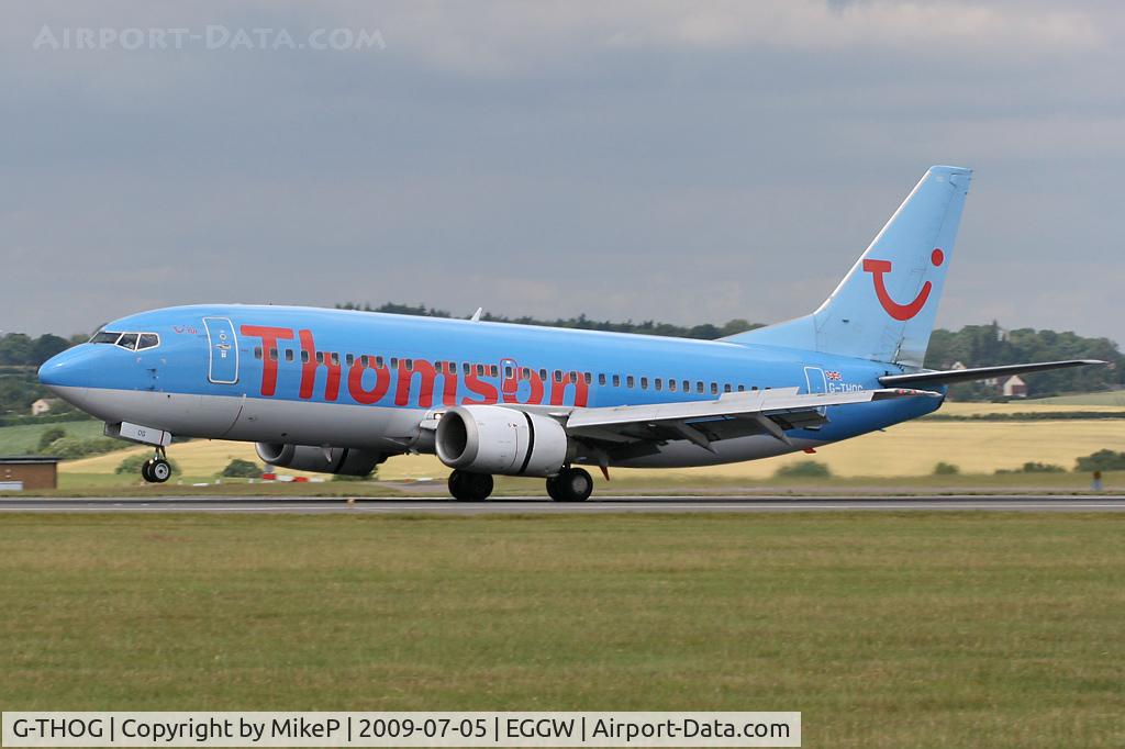 G-THOG, 1997 Boeing 737-31S C/N 29057, Touchdown on Runway 26.
