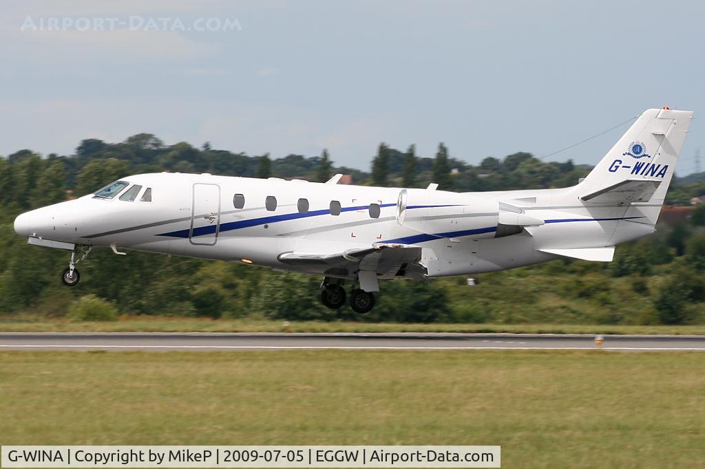 G-WINA, 2003 Cessna 560XL Citation Excel C/N 560-5343, Just about to touchdown on Runway 26.