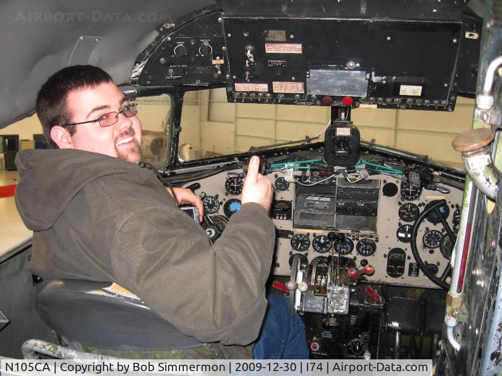 N105CA, 1944 Douglas DC3C-S4C4G (C-47B) C/N 14275, Kevin checking out the view from the left seat at the Champaign Aviation Museum - Urbana, Ohio.