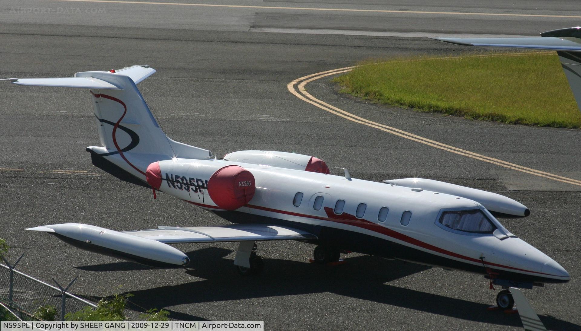 N595PL, 1981 Gates Learjet 35A C/N 35A-448, N595PW  park at the extreem cargo ramp
