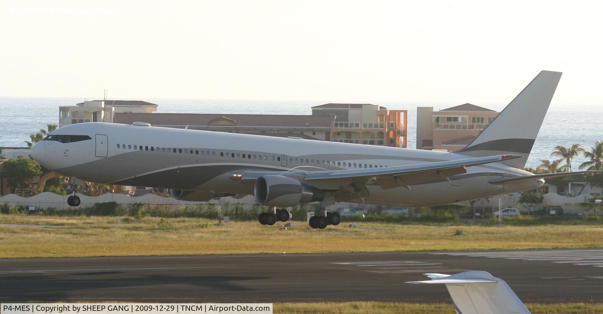 P4-MES, 2003 Boeing 767-33A C/N 33425, P4-MES the big bandit landing at TNCM runway 10 late afternoon.