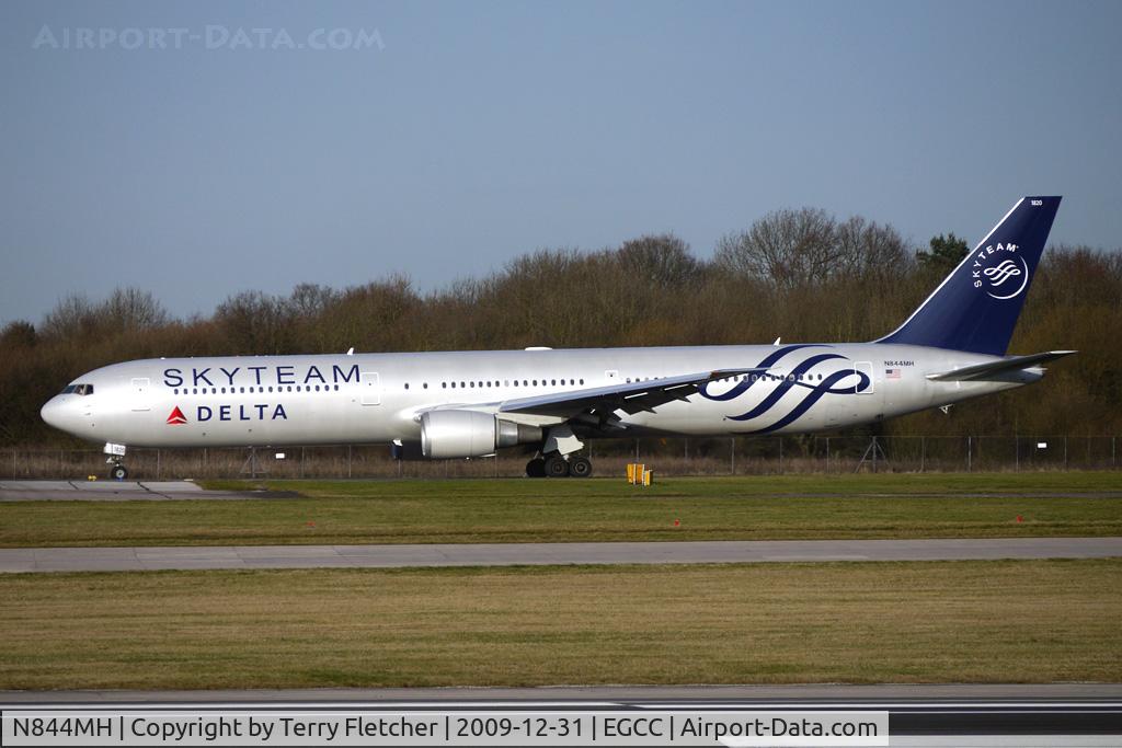 N844MH, 2002 Boeing 767-432/ER C/N 29717, Stunning livery on this Delta B767-400 series as it taxies for departure from Manchester