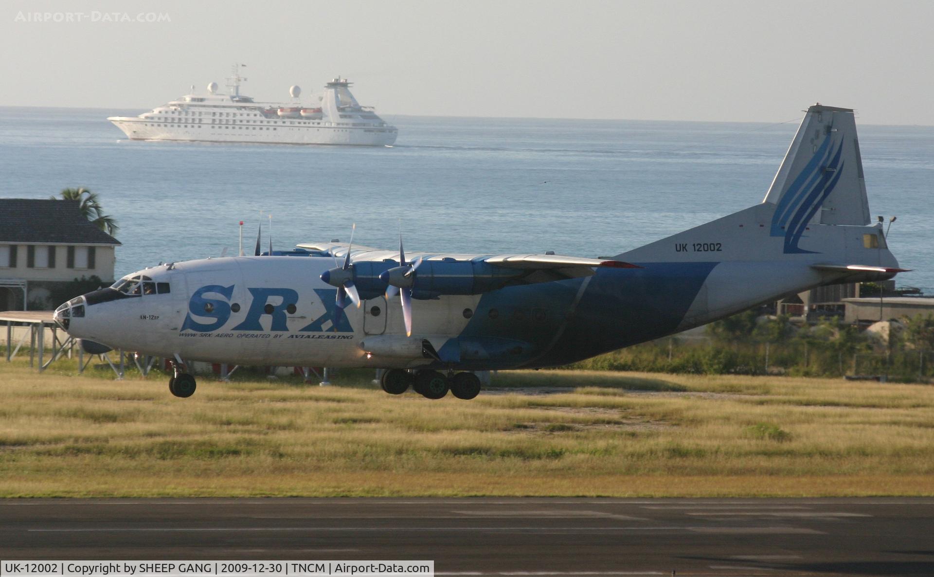 UK-12002, Antonov An-12BP C/N 402002, UK12002 Making an early morning landing at TNCM.