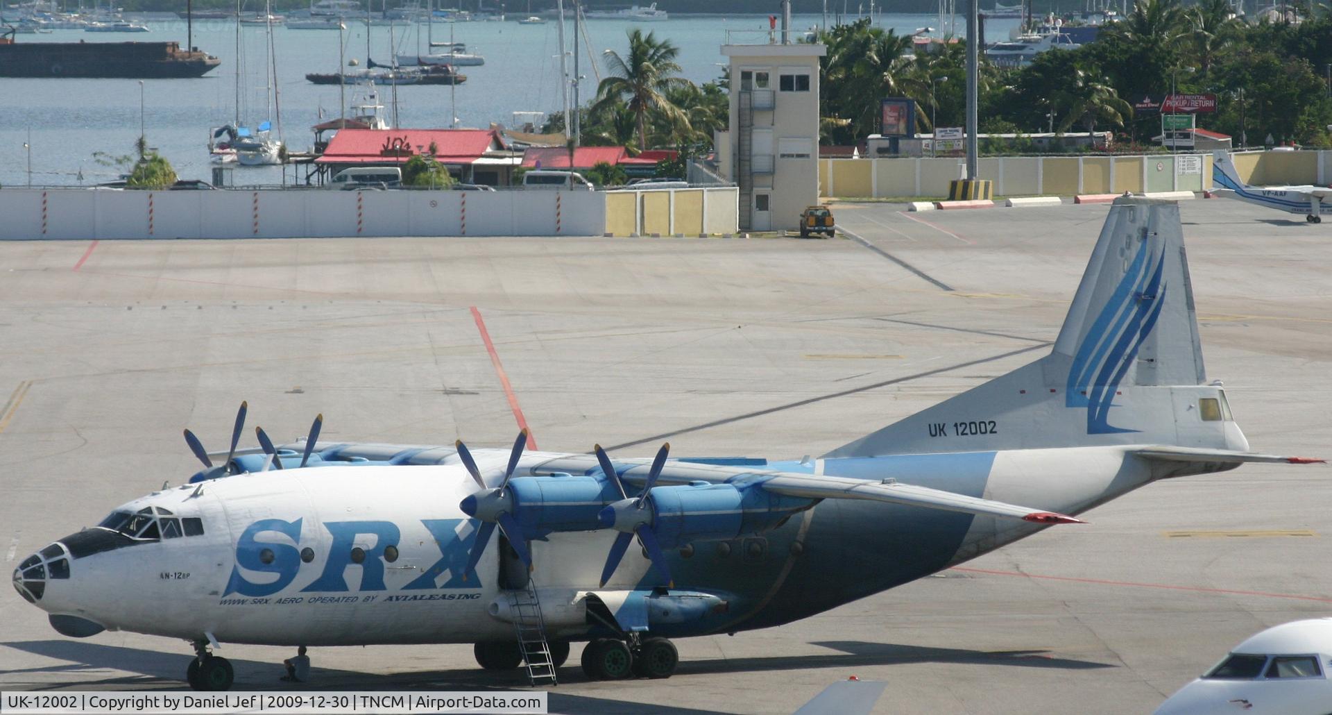 UK-12002, Antonov An-12BP C/N 402002, The UK 12002 park at the main ramp. this aircraft brought the Jayz and Beyonce Band to the island. then they went on to St Barths.