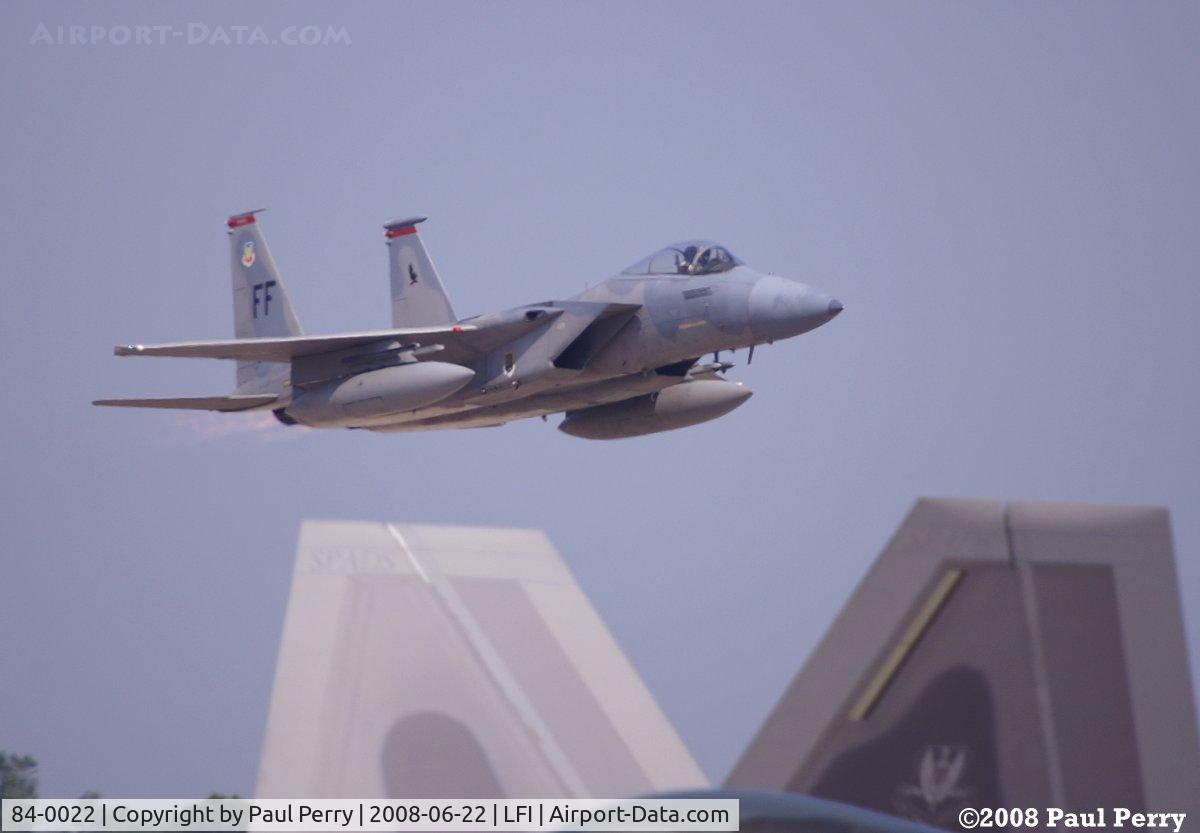 84-0022, 1984 McDonnell Douglas F-15C Eagle C/N 0932/C325, Taking off in full burner, with the Raptor's tail in sight