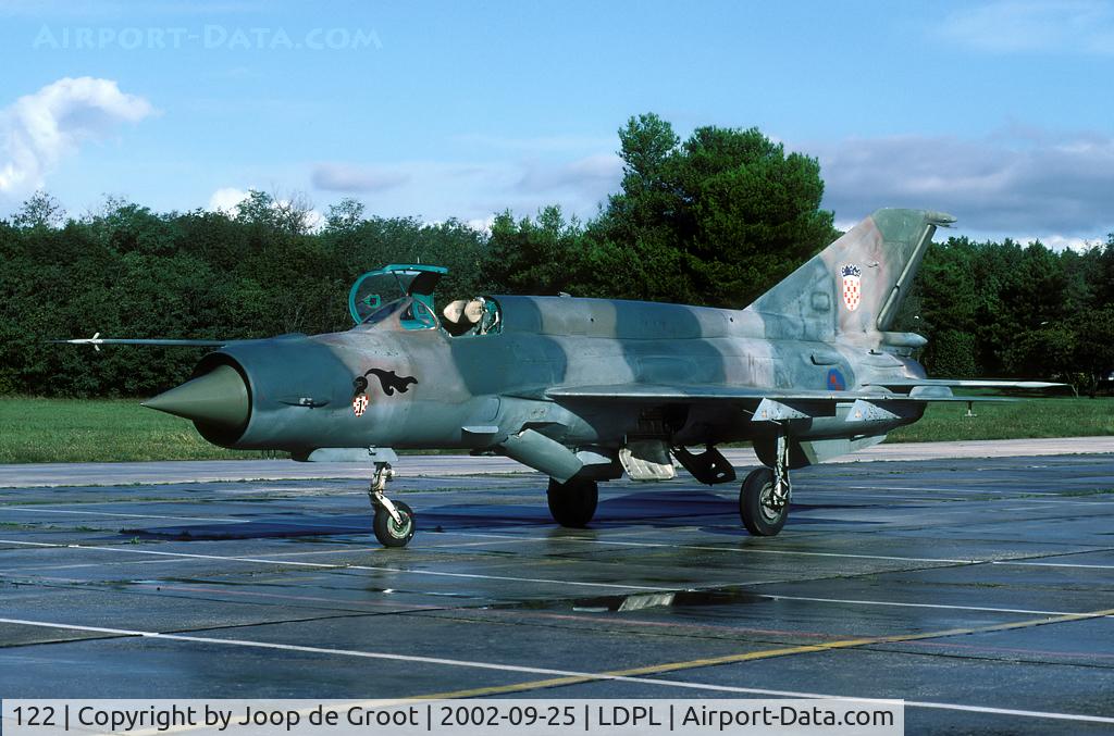 122, Mikoyan-Gurevich MiG-21bis C/N 75001122, After the rain cleared we were finally able to take the shotes we had been traveling for.