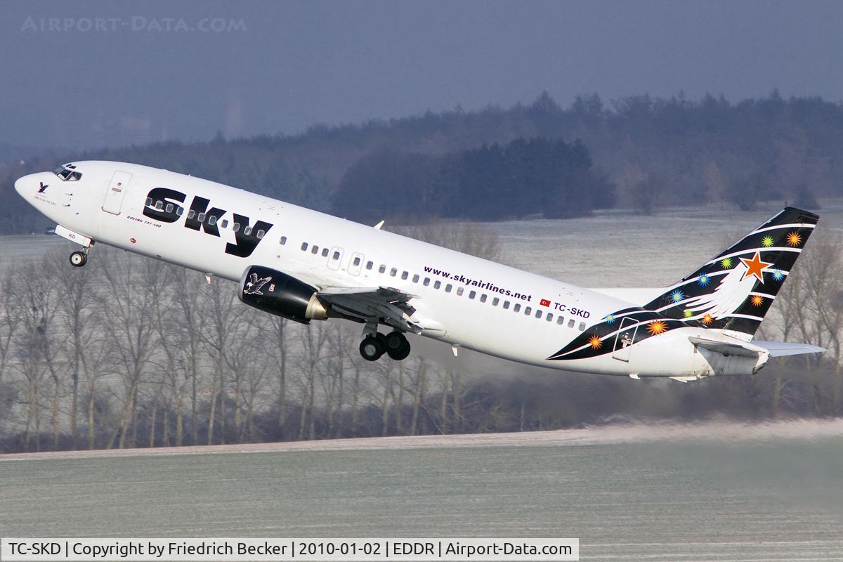 TC-SKD, 1992 Boeing 737-4Q8 C/N 25372, Black Eagle climbs out of Saarbruecken on a 