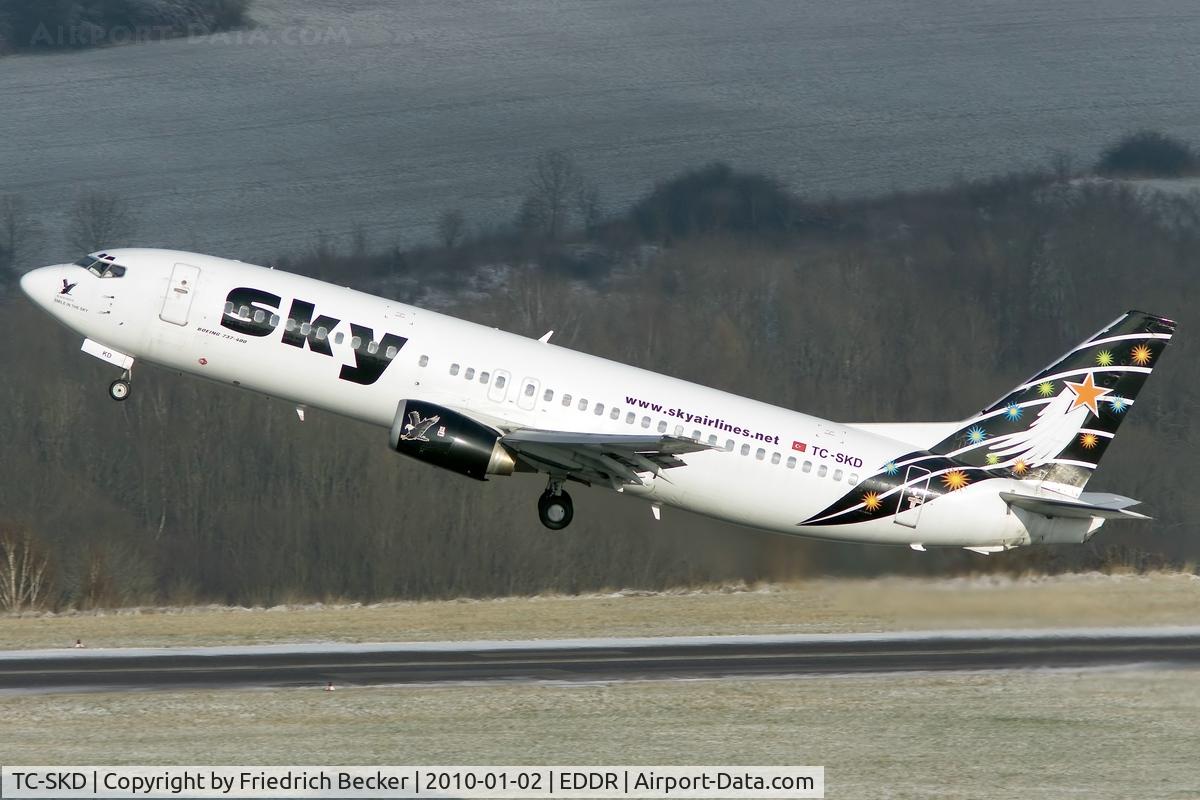 TC-SKD, 1992 Boeing 737-4Q8 C/N 25372, Black Eagle climbs out of Saarbruecken on a 