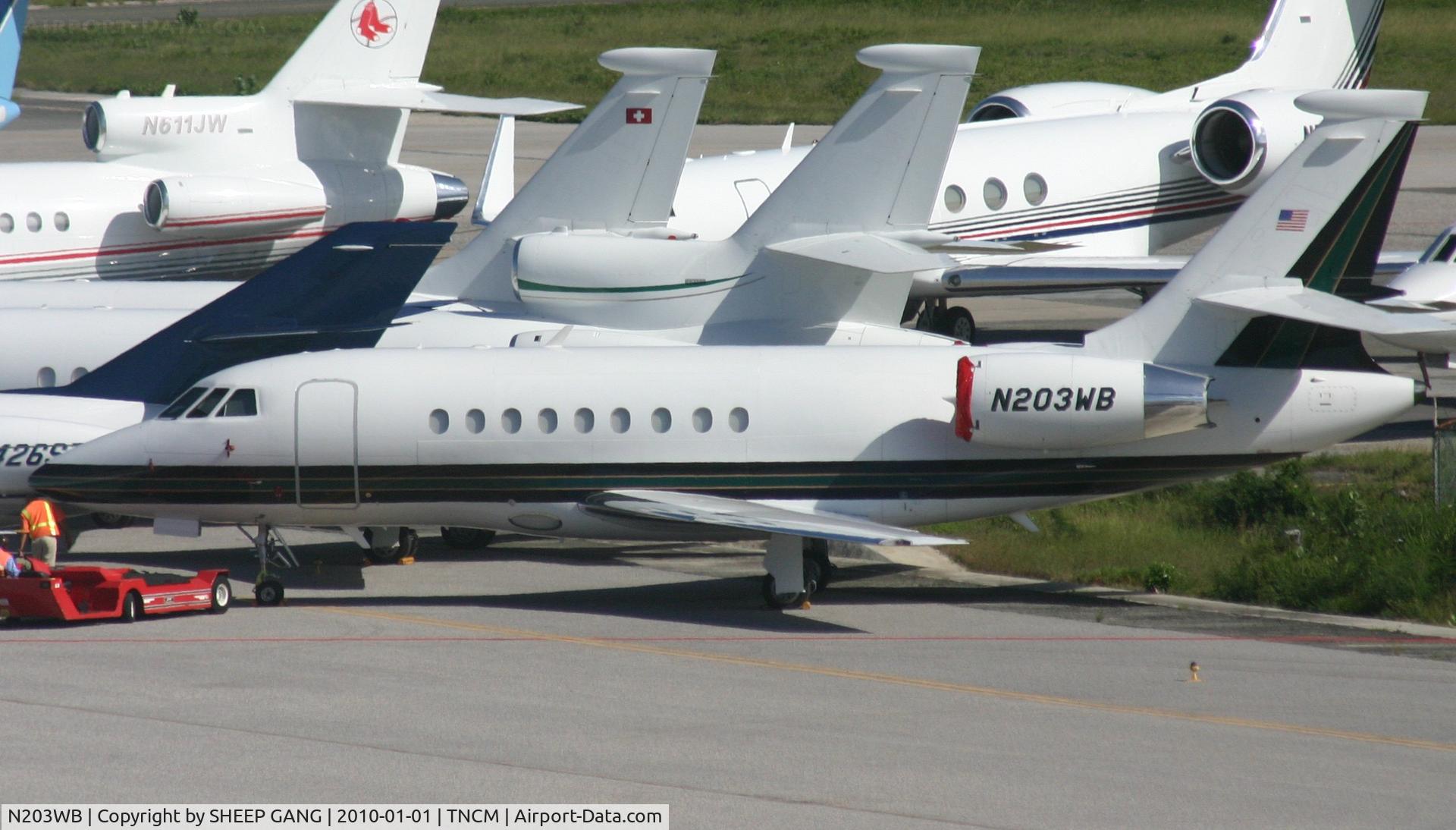 N203WB, 2002 Dassault Falcon 2000 C/N 144, N203WB park next to the fuel farm