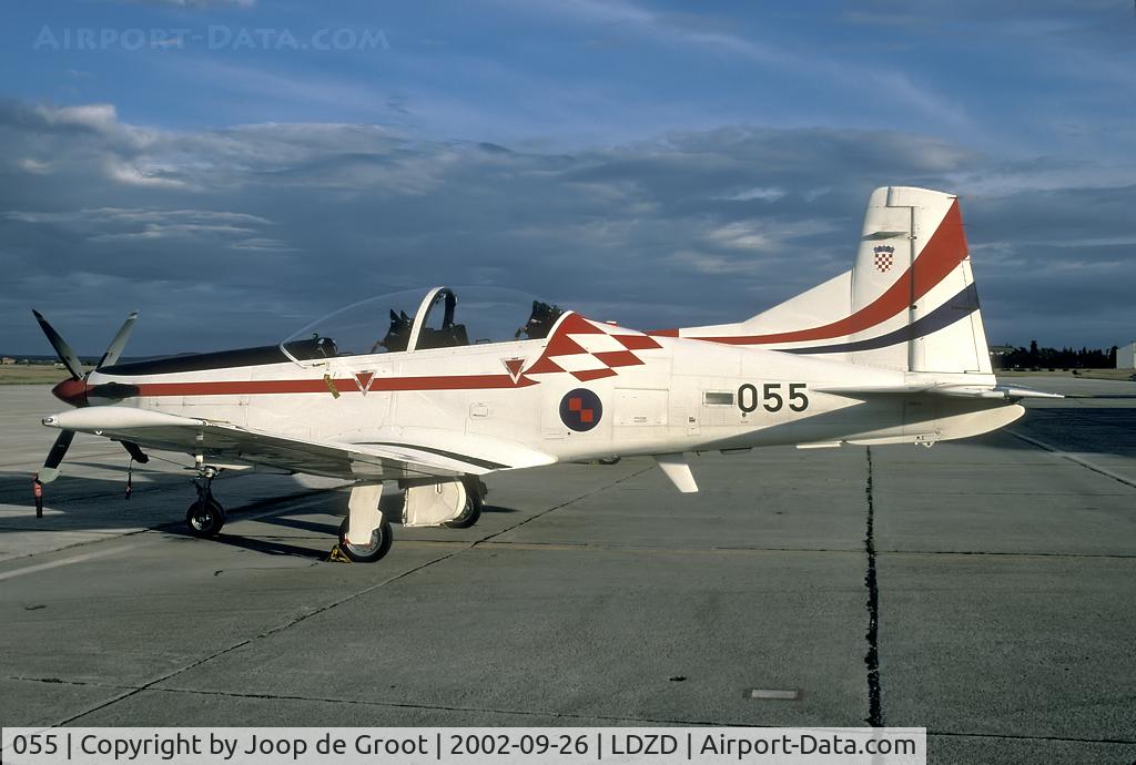 055, Pilatus PC-9M C/N 618, In the last sunlight of the day we finally got a change to photograph this aircraft. The sun was about to disappear behind the tree tops.