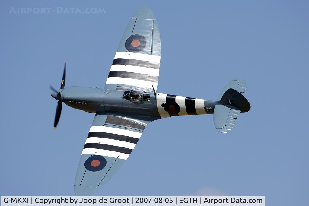 G-MKXI, 1944 Supermarine 365 Spitfire PR.XI C/N 6S/504719, Neat display during the 2007 air show at Old Warden. This Spitfire has been resting and rusting  for tens of yours in the woods of the Overloon museum before being rescued.