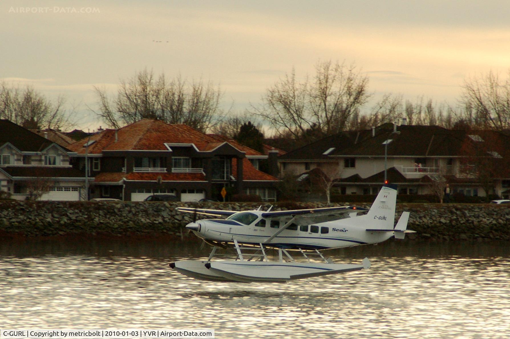 C-GURL, 2008 Cessna 208 Caravan I C/N 20800501, landing on the Fraser River on a cold Jan. afternoon