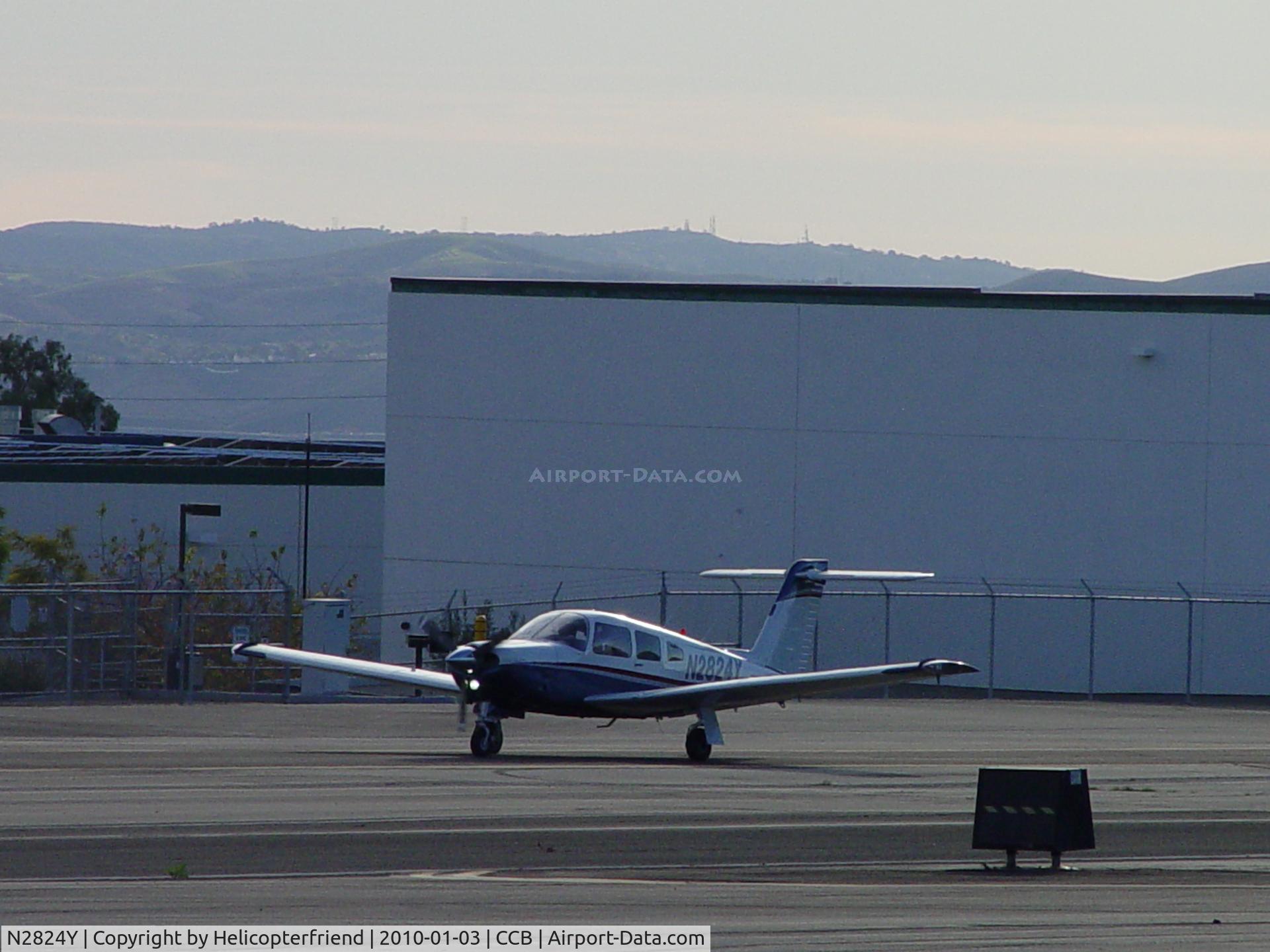 N2824Y, 1979 Piper PA-28RT-201 Arrow IV C/N 28R-7918161, Taxiing back towards the parking area after roll out