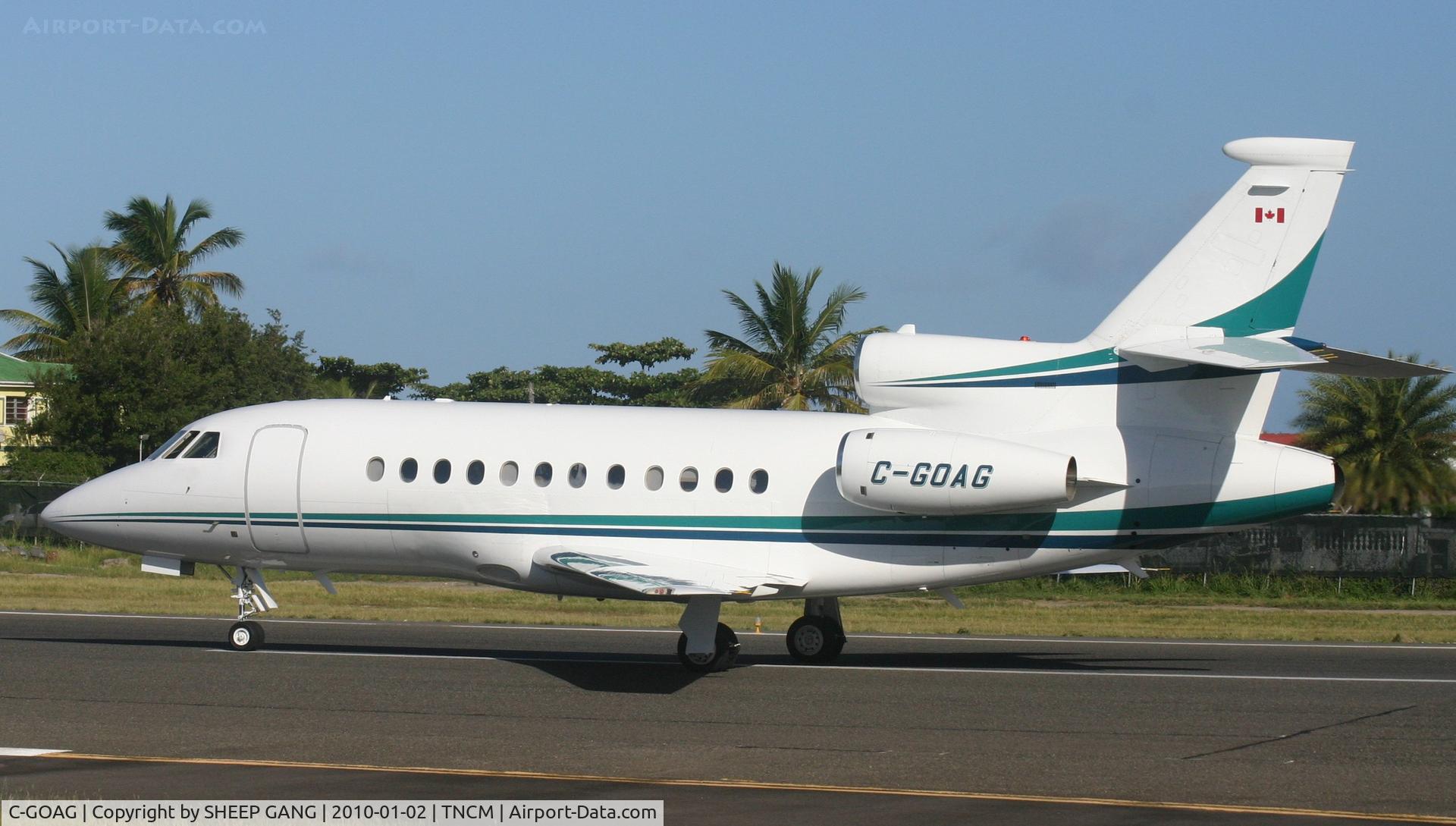 C-GOAG, 1997 Dassault Falcon 900EX C/N 15, C-GOAG just landed at TNCM and back tracking the active for parking