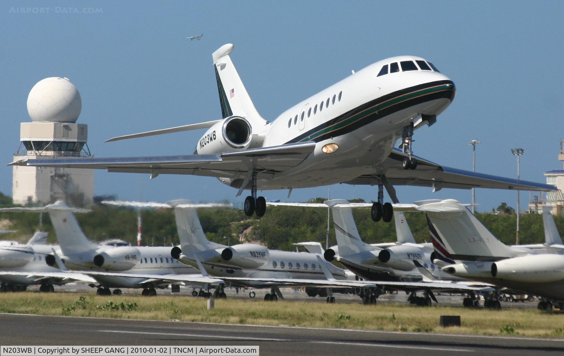 N203WB, 2002 Dassault Falcon 2000 C/N 144, N203WB departing TNCM