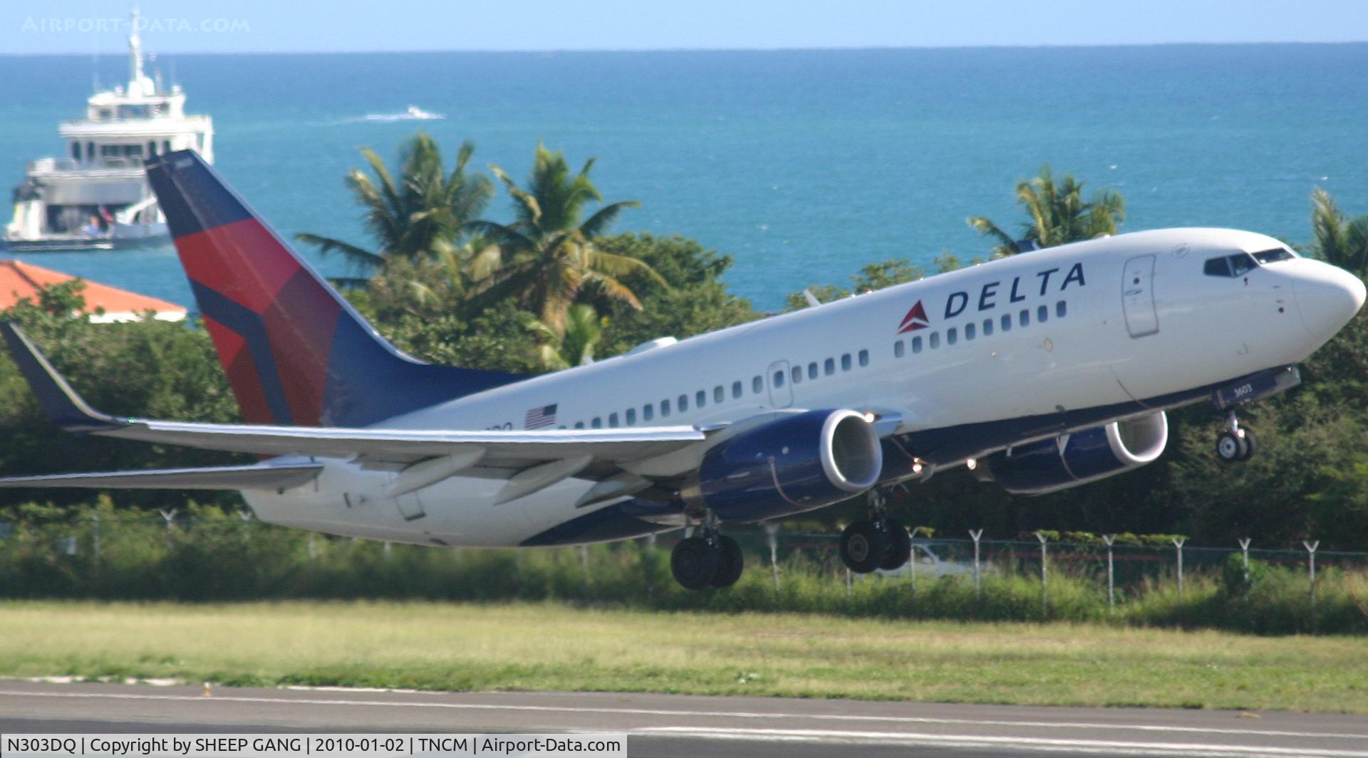 N303DQ, 2008 Boeing 737-732 C/N 29688, Delta airlines departing TNCM runway 28