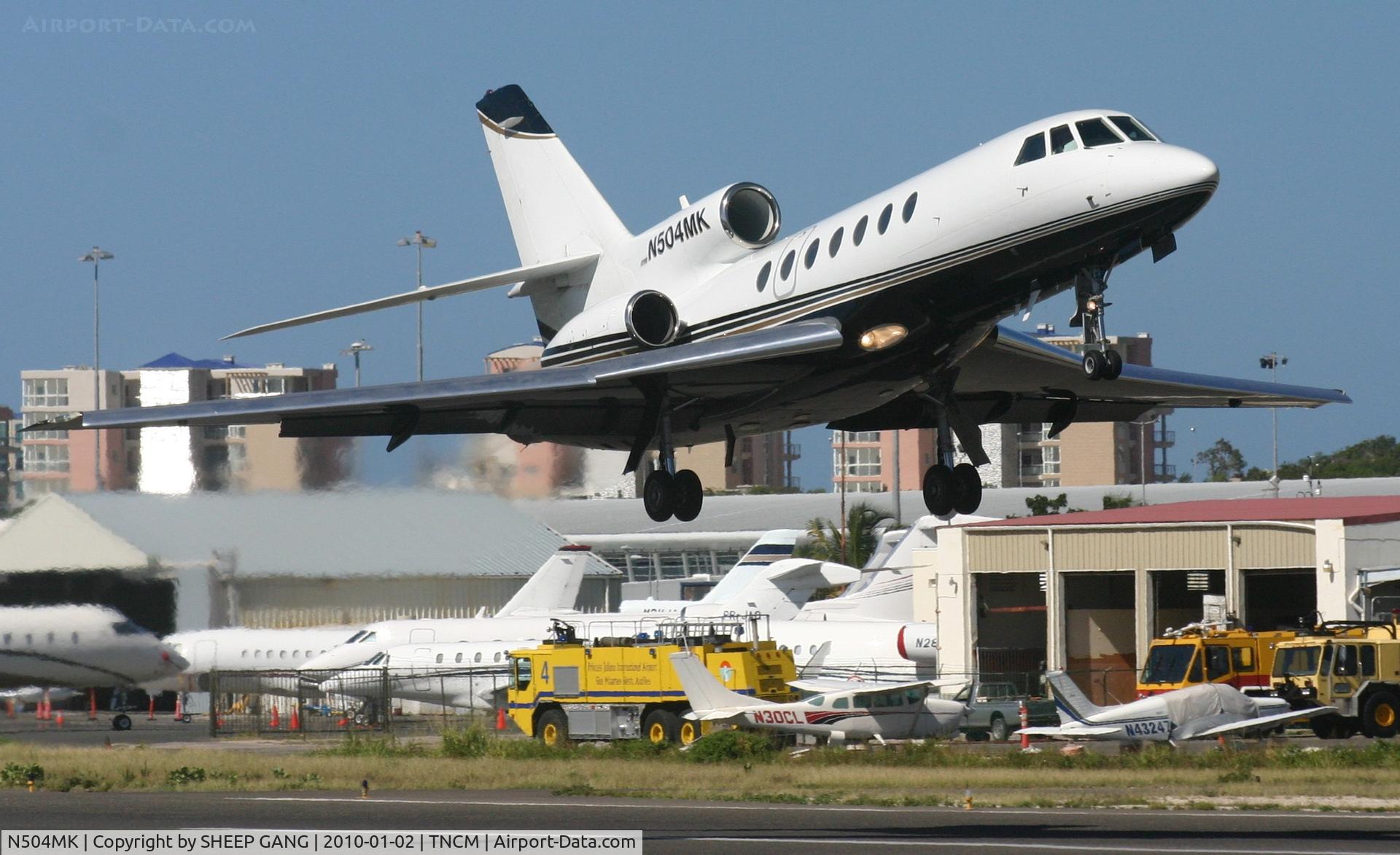 N504MK, 1990 Dassault Falcon 50 C/N 205, N504MK departing TNCM