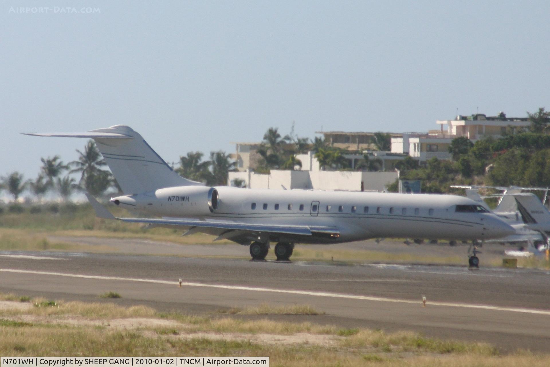 N701WH, 1999 Bombardier BD-700-1A10 Global Express C/N 9010, N701WH just landed at TNCM and leaving the active for the ramp