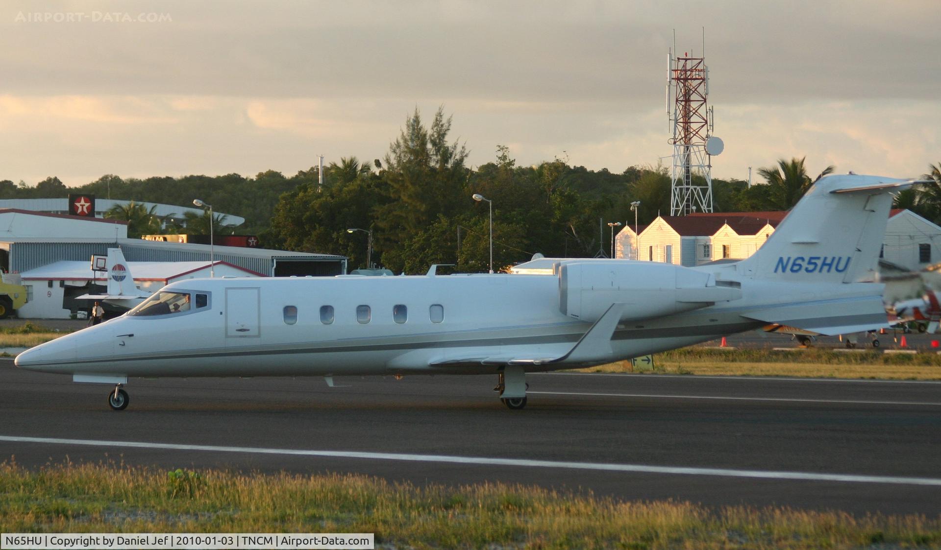 N65HU, 2001 Learjet Inc 60 C/N 228, N65HU just landed at TNCM back tracking the active for parking