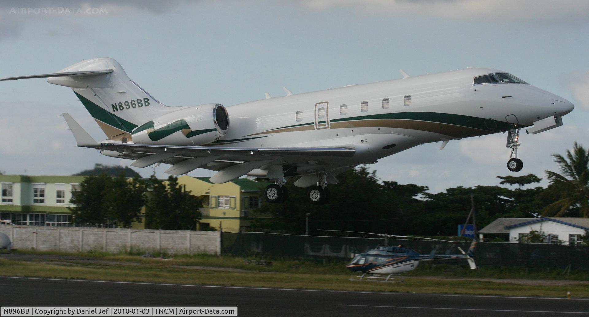 N896BB, 2007 Bombardier Challenger 300 (BD-100-1A10) C/N 20177, N896BB departing TNCM