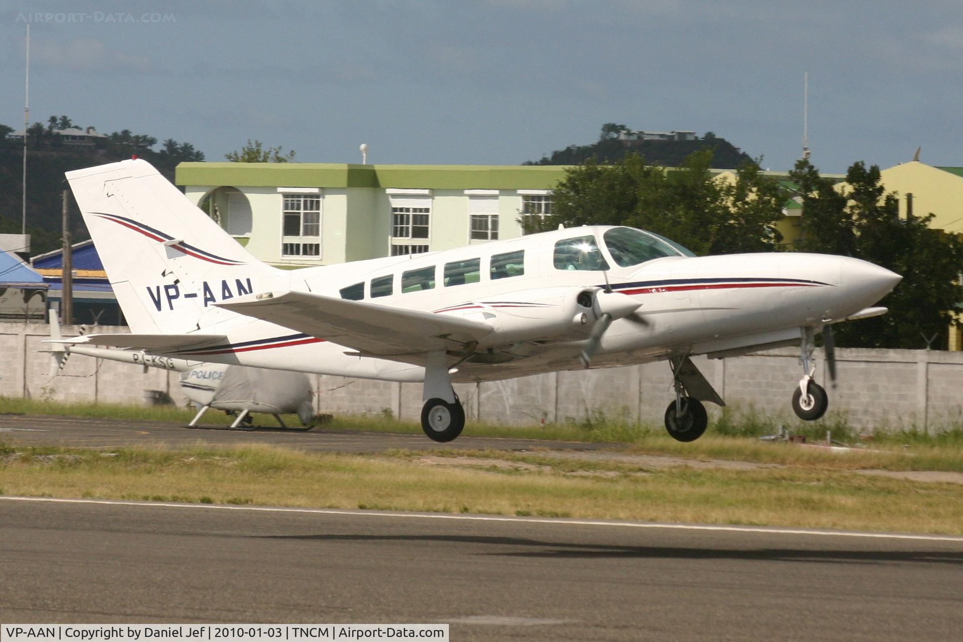 VP-AAN, 1979 Cessna 402C Businessliner C/N 402C0029, VP-AAN departing  tncm