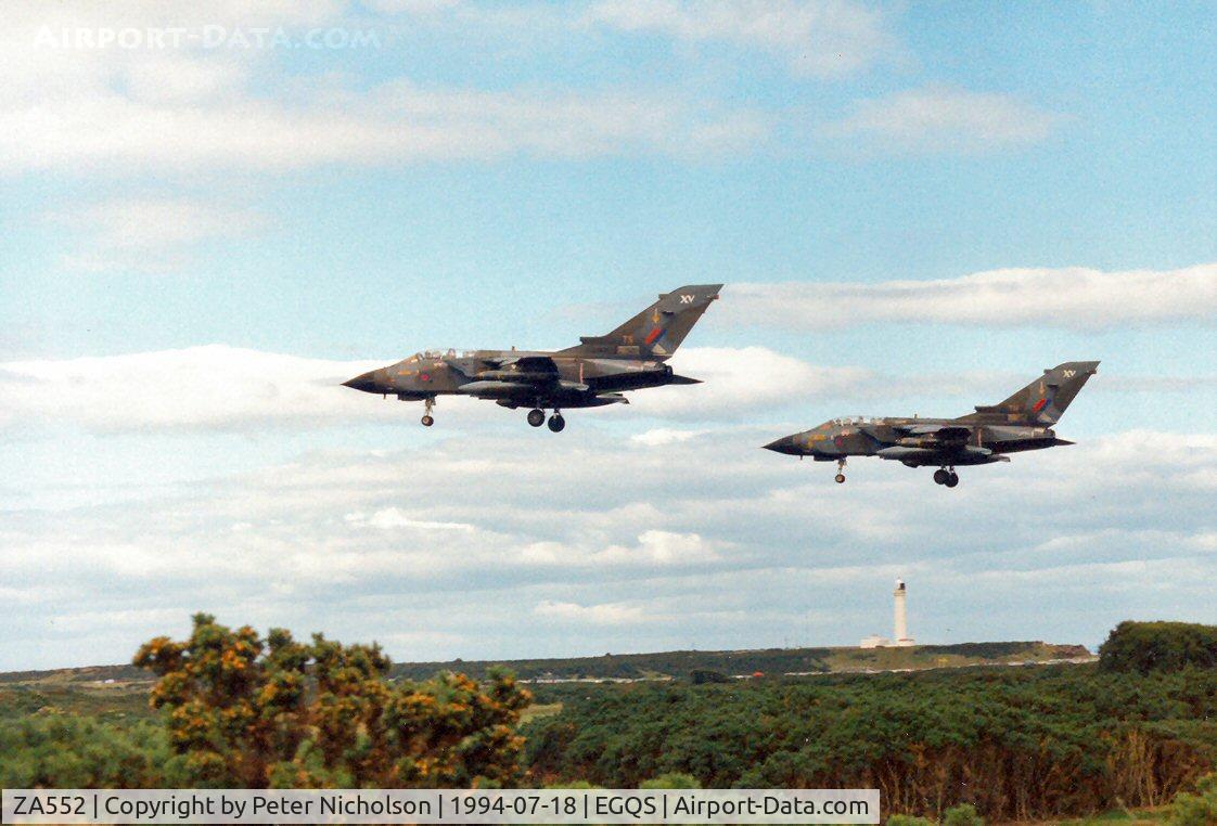 ZA552, 1981 Panavia Tornado GR.1 C/N 068/BT019/3036, Tornado GR.1 of 15[R] Squadron returning to base at Lossiemouth with ZA600 coded TH also of 15[R] Squadron in the Summer of 1994.
