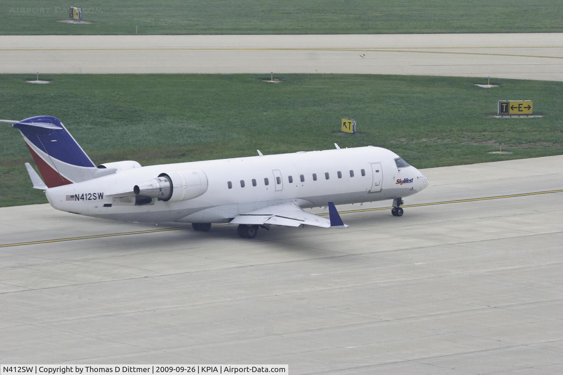 N412SW, 1995 Canadair CRJ-200ER (CL-600-2B19) C/N 7101, Sky West (N412SW) taxiies for departure