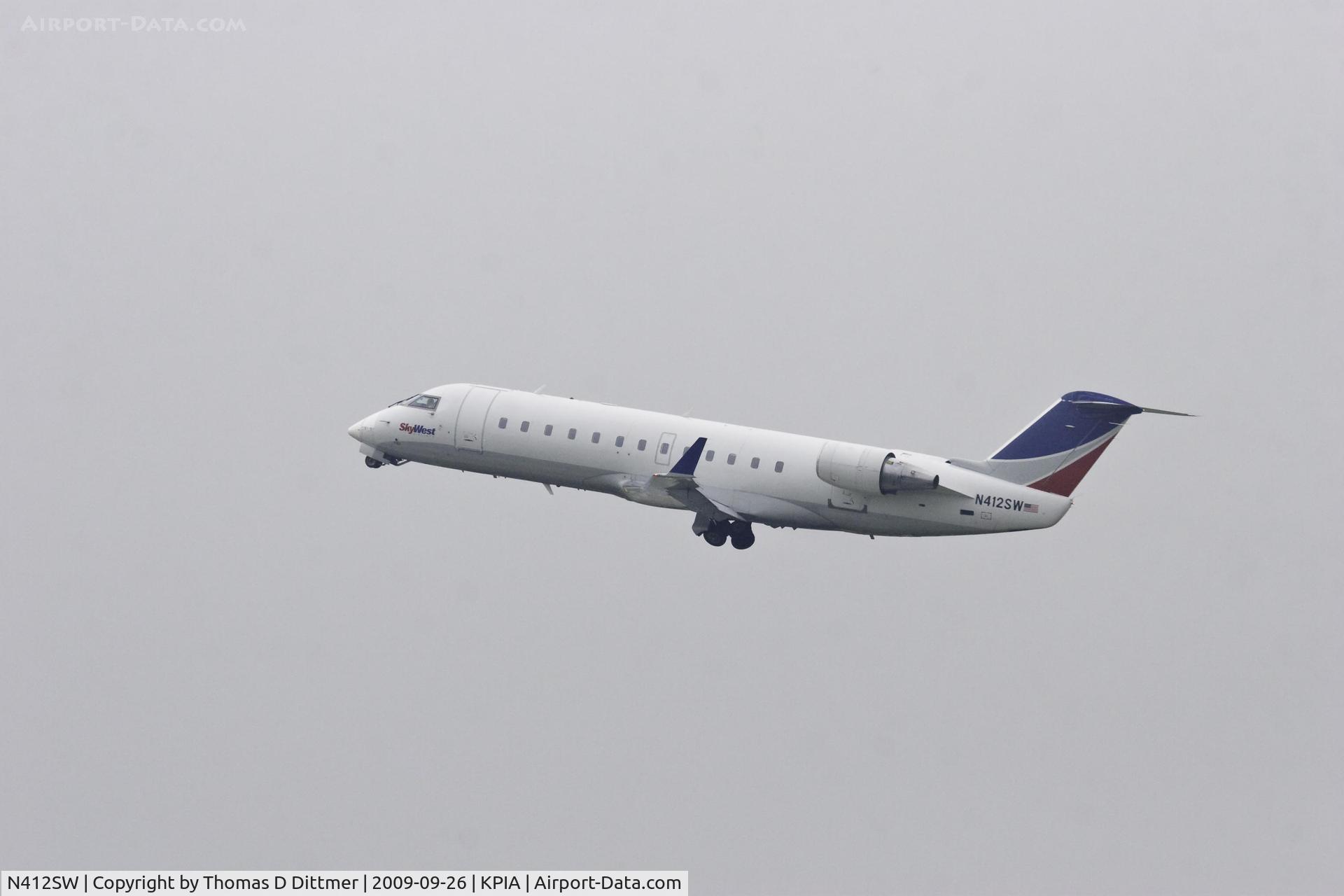 N412SW, 1995 Canadair CRJ-200ER (CL-600-2B19) C/N 7101, Sky West (N412SW) climbing out