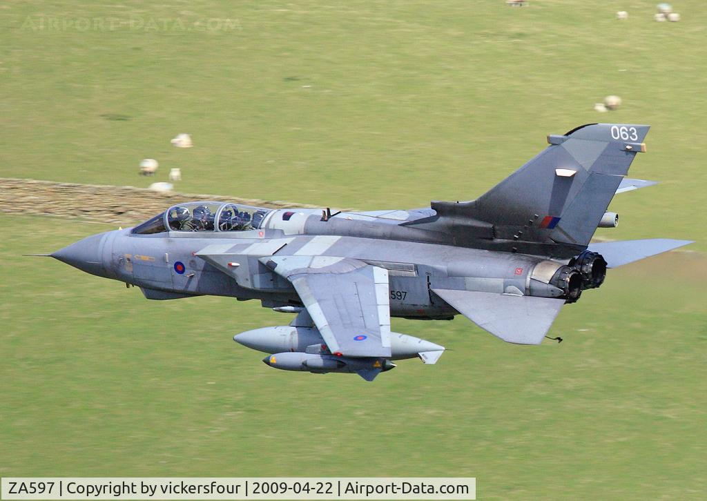 ZA597, 1982 Panavia Tornado GR.4 C/N 116/BS038/3061, Royal Air Force Tornado GR4 (c/n BS038) operated by the Marham Wing, coded '063'. Taken in the M6 Pass, Cumbria. Note the arrestor hook hanging down.
