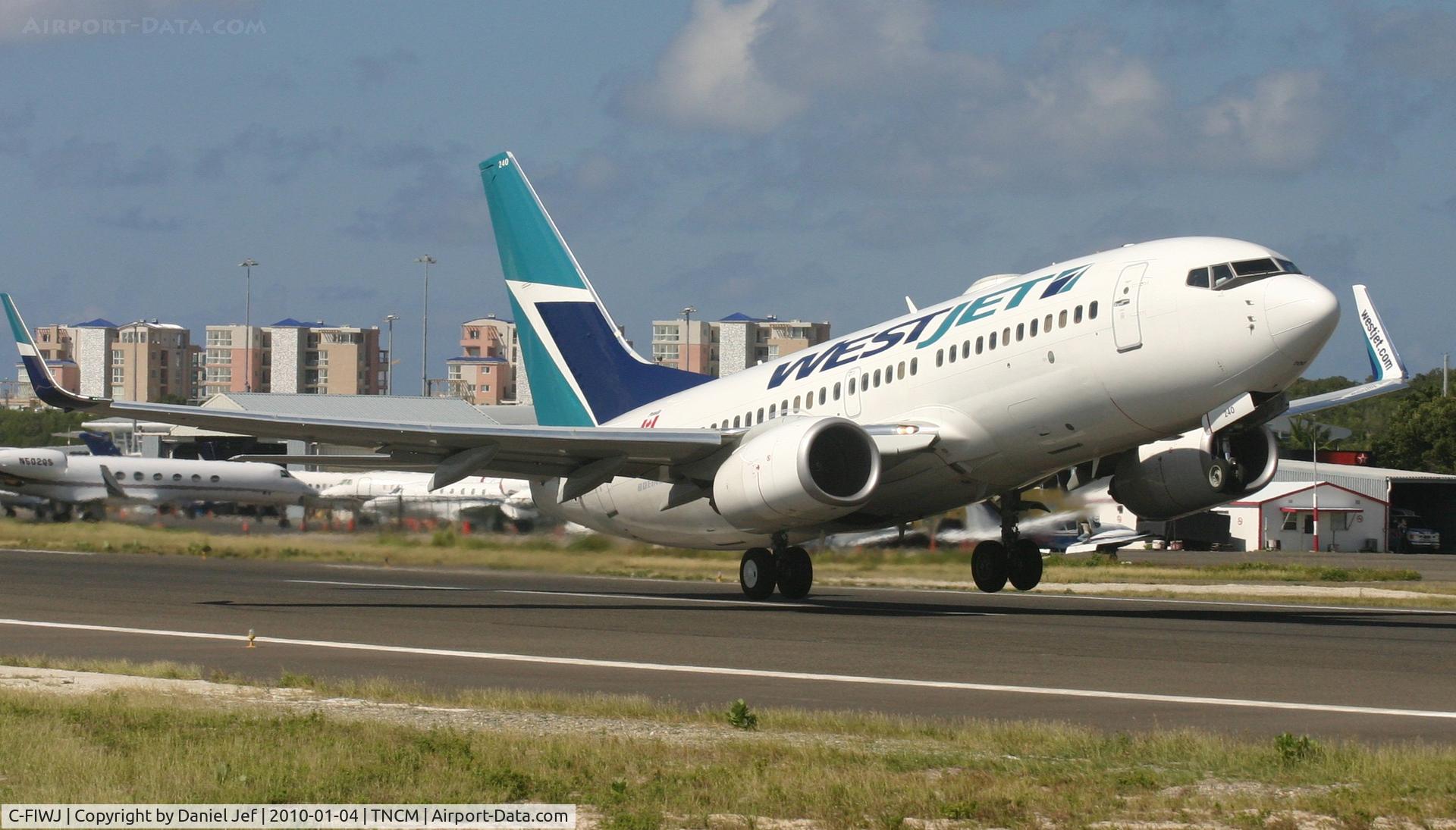 C-FIWJ, 2007 Boeing 737-7CT C/N 30712, Westjet C-FIWJ departing TNCM runway 10