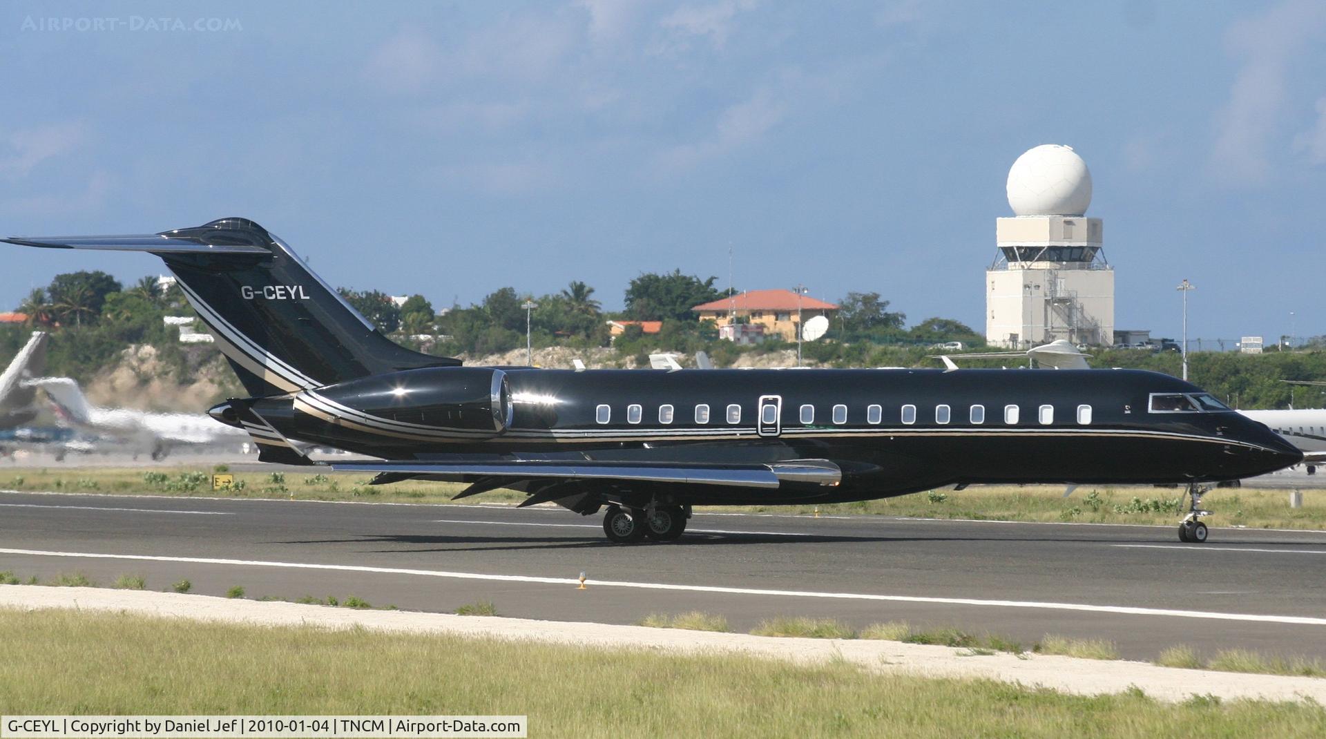 G-CEYL, 2006 Bombardier BD-700-1A10 Global Express C/N 9196, G-CEYL back tracking the active runway for parking on the cargo ramp