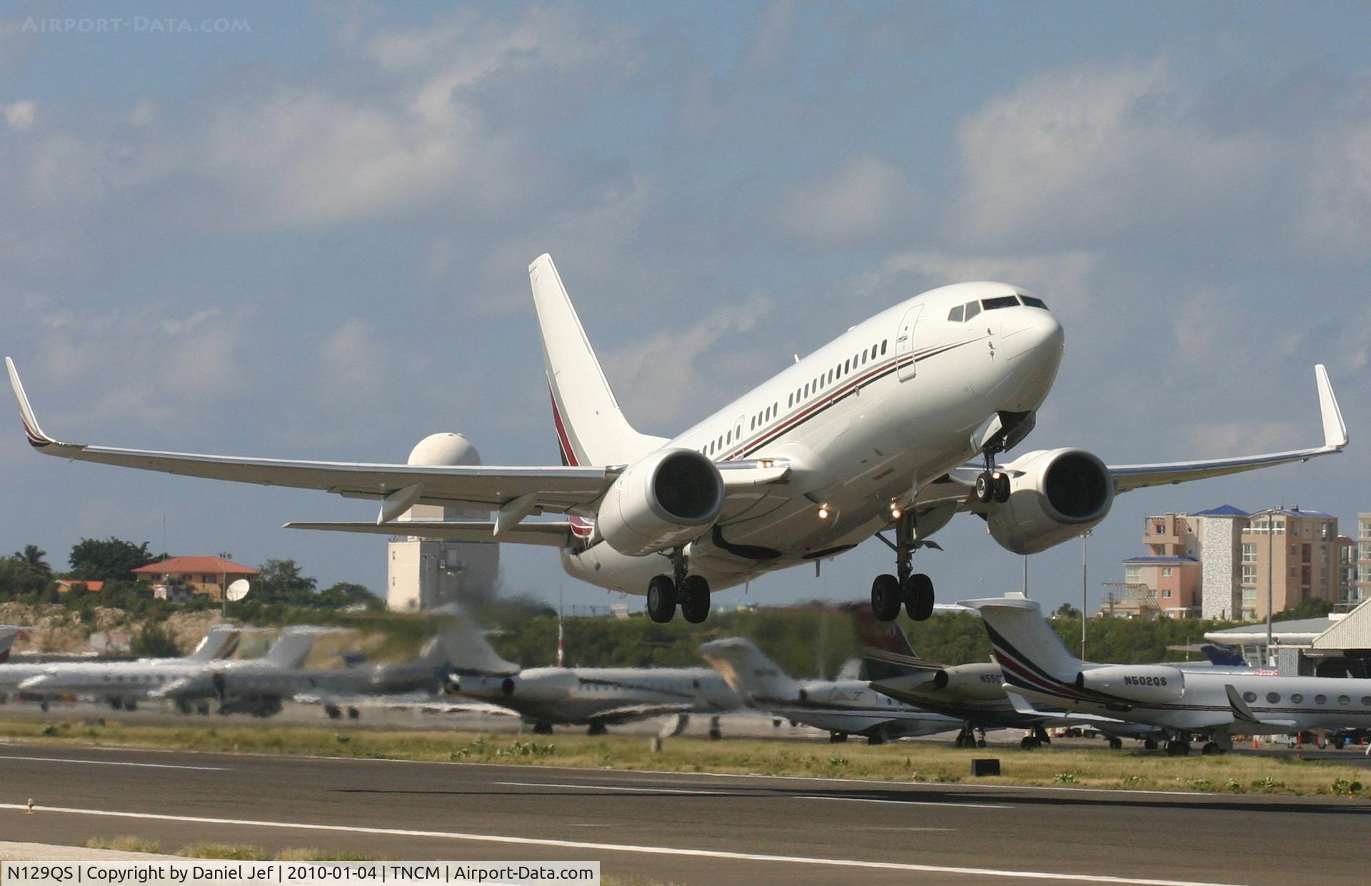 N129QS, 1999 Boeing 737-7BC C/N 30329, N129QS departing TNCM on a midday flight