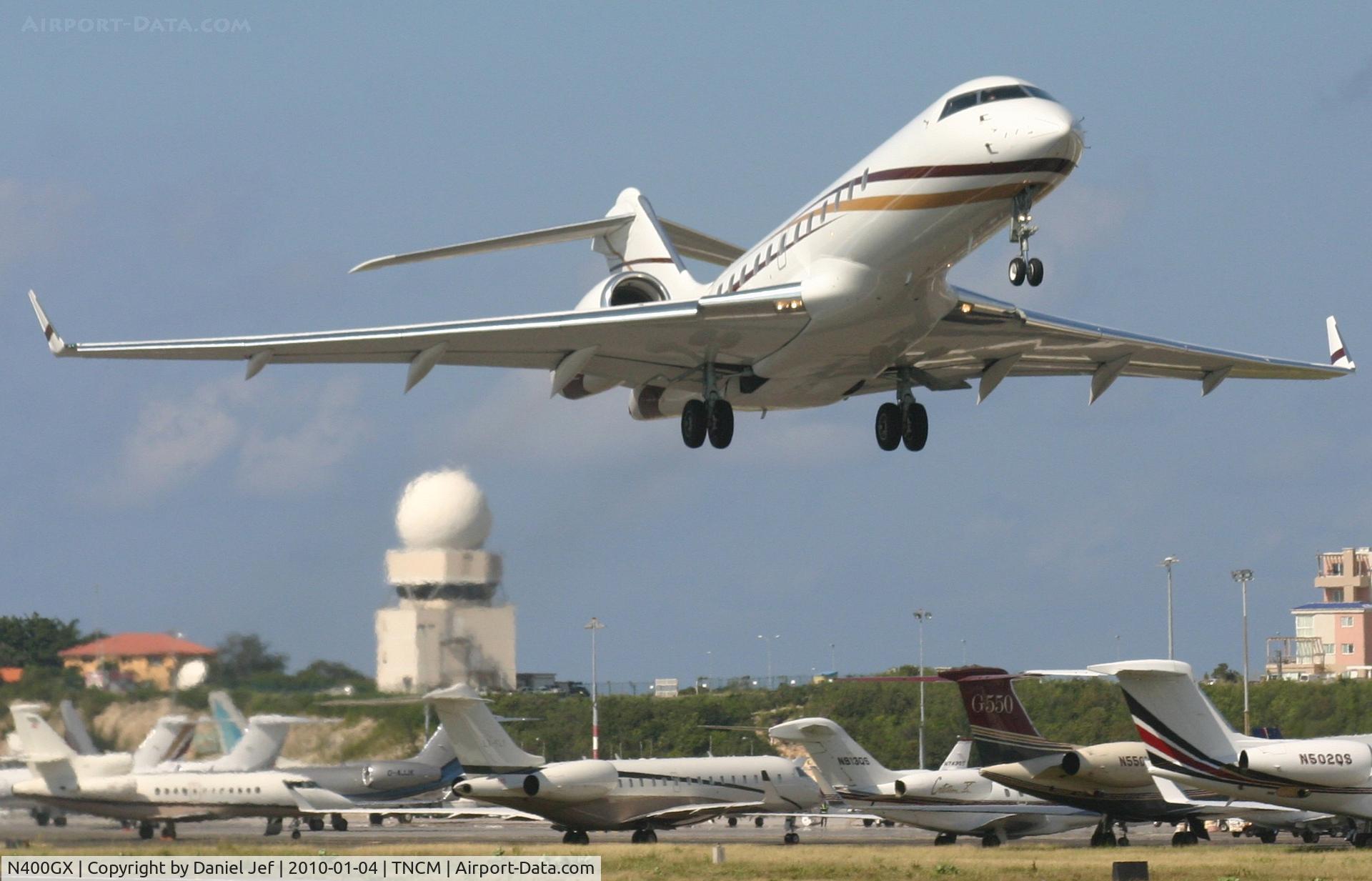 N400GX, 1999 Bombardier BD-700-1A10 Global Express C/N 9037, N400GX departing TNCM
