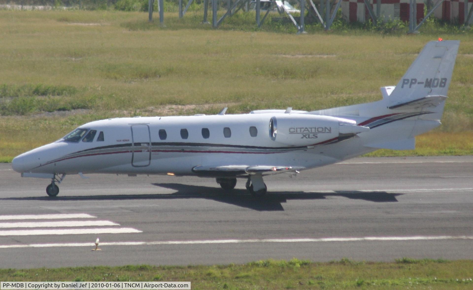 PP-MDB, Cessna 560XL Citation XLS C/N 560-5552, PP-MOB departing TNCM