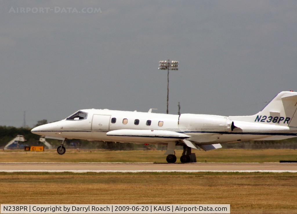 N238PR, 1981 Gates Learjet 35A C/N 394, LJ35 touches down 17L.